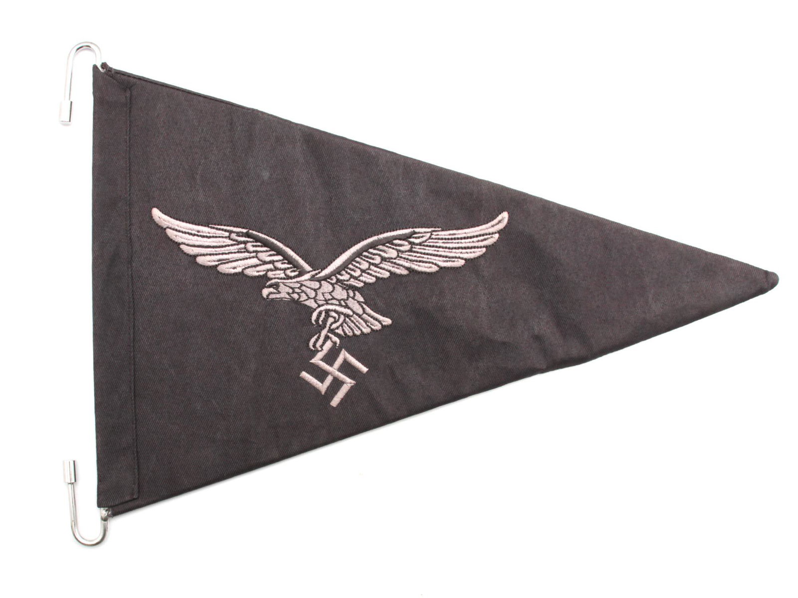 A WWII THIRD REICH LUFTWAFFE GENERAL CAR PENNANT: A German Third Reich WWII Luftwaffe Generals car pennant. Black cotton triangle with metal hooks for holding, with white embroidered image of the state symbol of Nazi Germany, flying eagle with a fasc