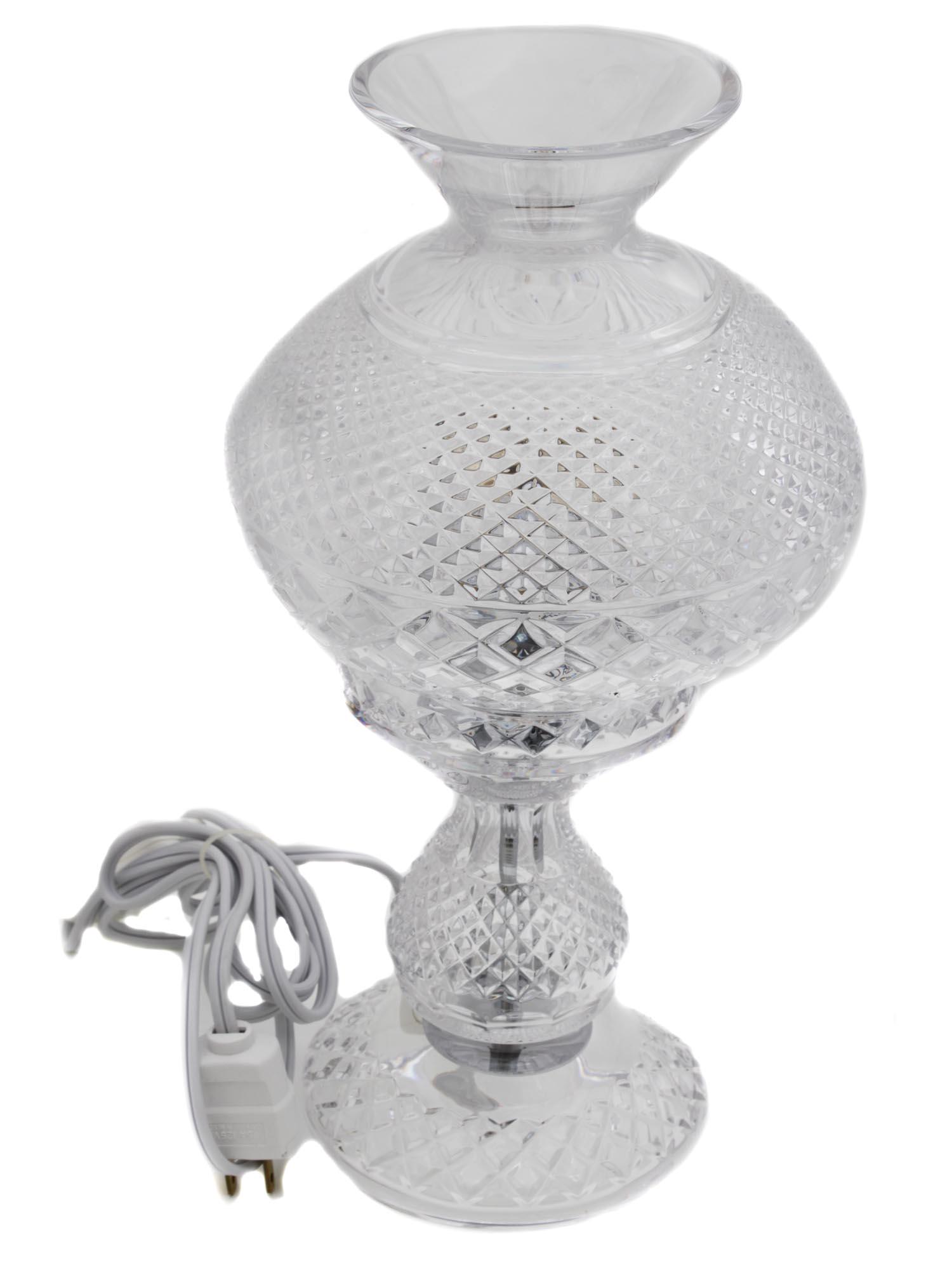 A VINTAGE WATERFORD CRYSTAL INISHMAAN TABLE LAMP: A vintage electric Waterford diamond cut crystal Inishmaan table lamp. This model was named after Inishmaan Island off the coast of Co. Galway on the west coast of Ireland. Supplied in an original box