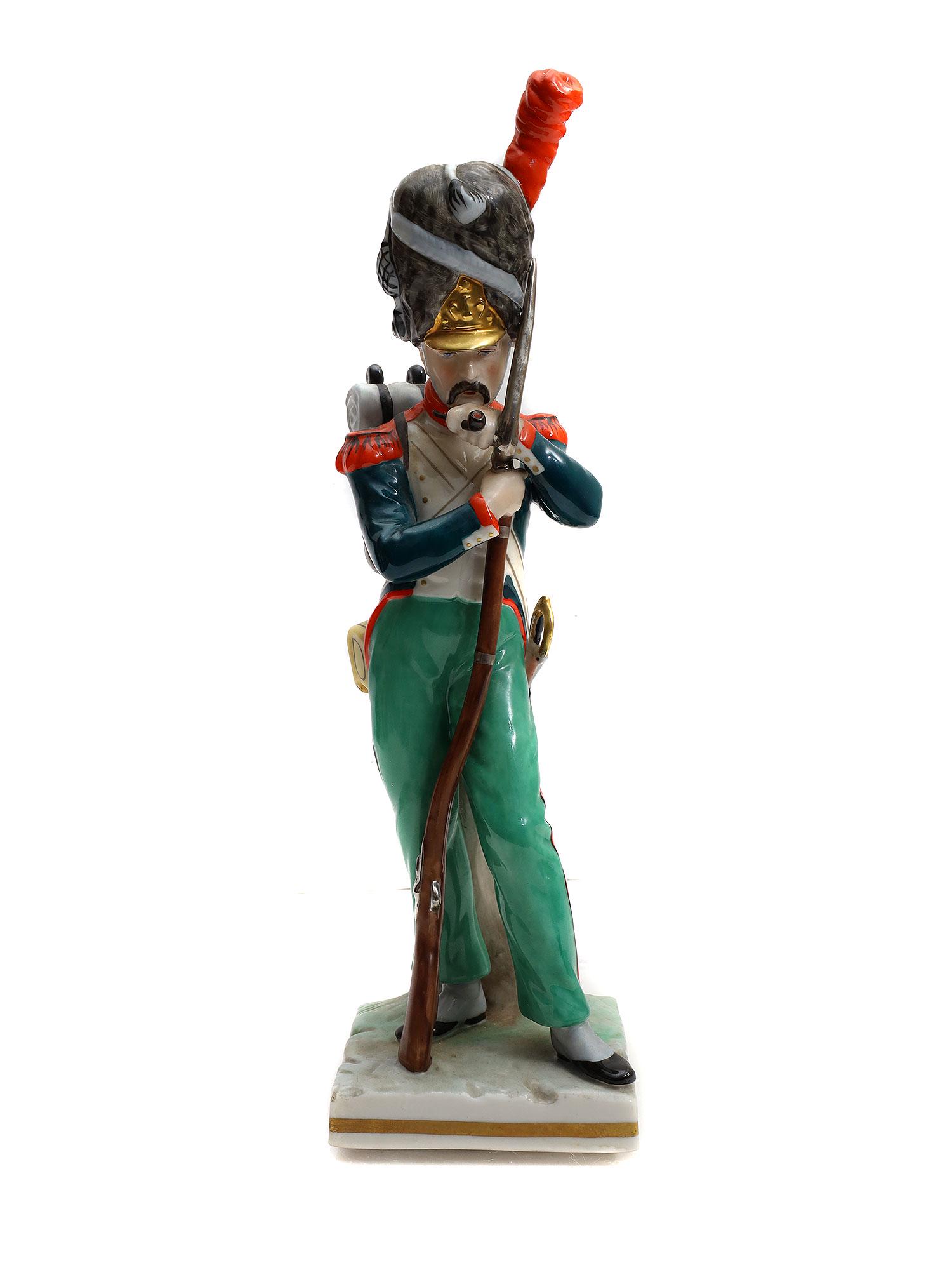 AN ANTIQUE GERMAN PORCELAIN FIGURINE OF GRENADIER (1 of 4)