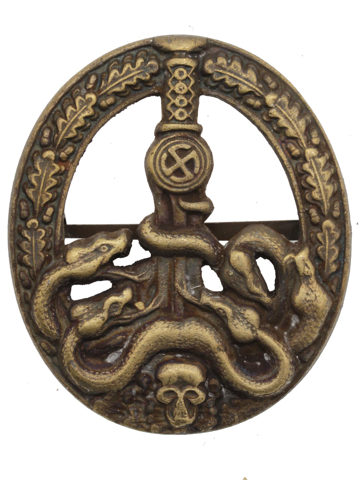 A GERMAN WWII THIRD REICH ANTI PARTISAN BADGE: This is a German WWII Army Heer Anti Partisan Badge. The front shows six snakes on the lower part wrapped around a sword blade with a skull at the base, surrounded by an oval oak leaf wreath. It has a