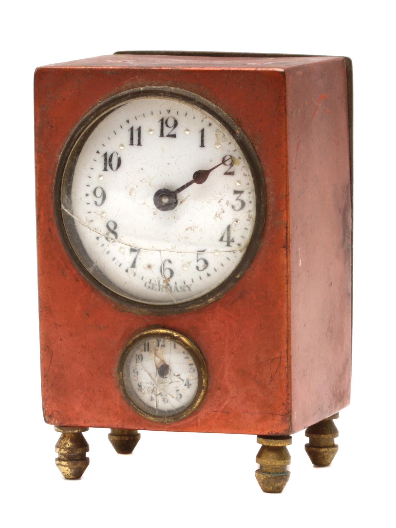 AN ANTIQUE GERMAN ENAMEL OVER BRASS TRAVEL CLOCK (1 of 7)