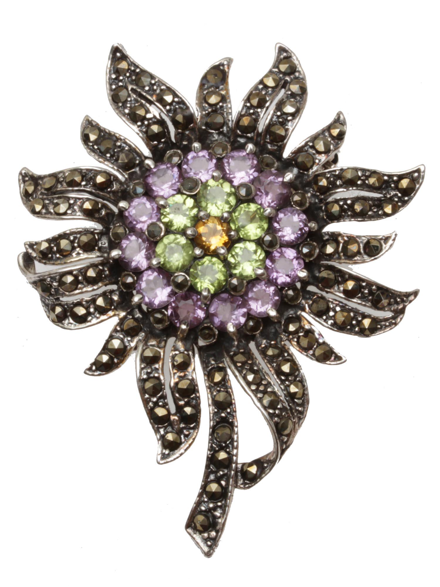 A VINTAGE FLOWER BROOCH SILVER MARCASITE GEMSTONE: A vintage jewelry fashion brooch made from sterling silver in the shape of beautiful sunflower, incrusted with marcasite on leaves and inlaid with gorgeous purple, green, and orange gemstones rhinesto