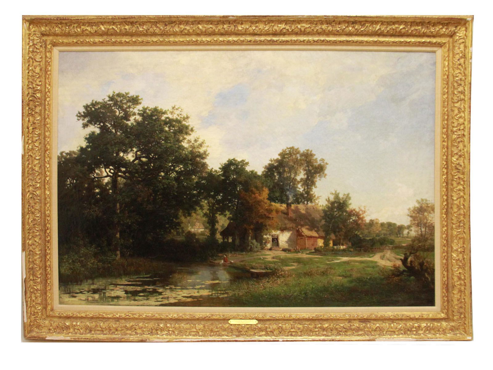 FRENCH OIL LANDSCAPE PAINTING ON CANVAS BY DUPRE: Jules Dupre (French, 1811-1889) oil painting on canvas, Landscape Scene with Rustic Farm House near a Lake, 1869. Signed lower right. Framed. The goldtone plate showing the artist, his life years and