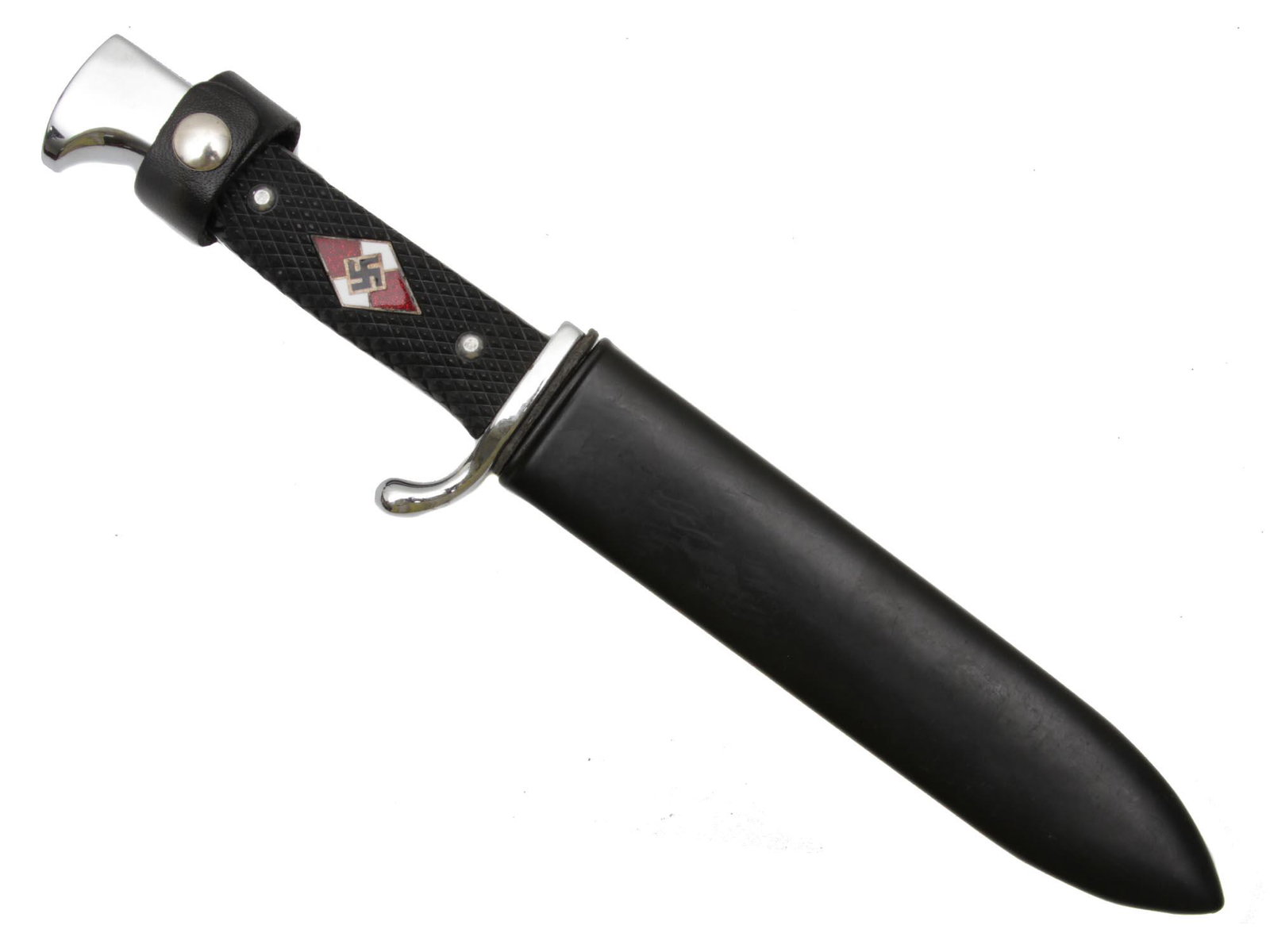 A WWII GERMAN THIRD REICH HITLER YOUTH DAGGER: A WWII German Third Reich Hitler Youth member dagger, 1939, with original magnetic sheet metal scabbard. The knife has molded, black bakelite grips with an enameled swastika to the center. Engraved, B