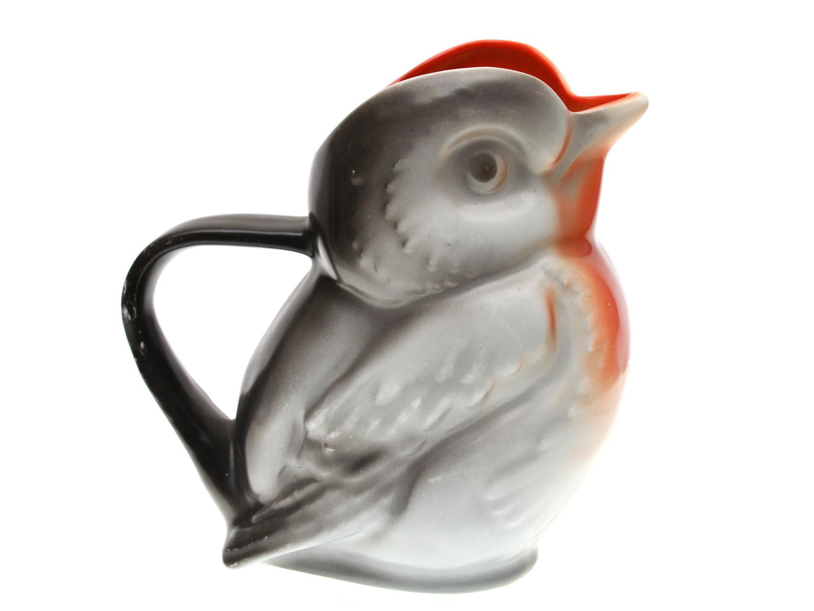 A ROYAL BAYREUTH PORCELAIN ROBIN MILK PITCHER: A gorgeous vintage Royal Bayreuth Bavarian porcelain figural Milk Pitcher designed in the shape of a beautiful robin, with plumage of gray, red, and black shades. Marked on the bottom with a Blue Roya