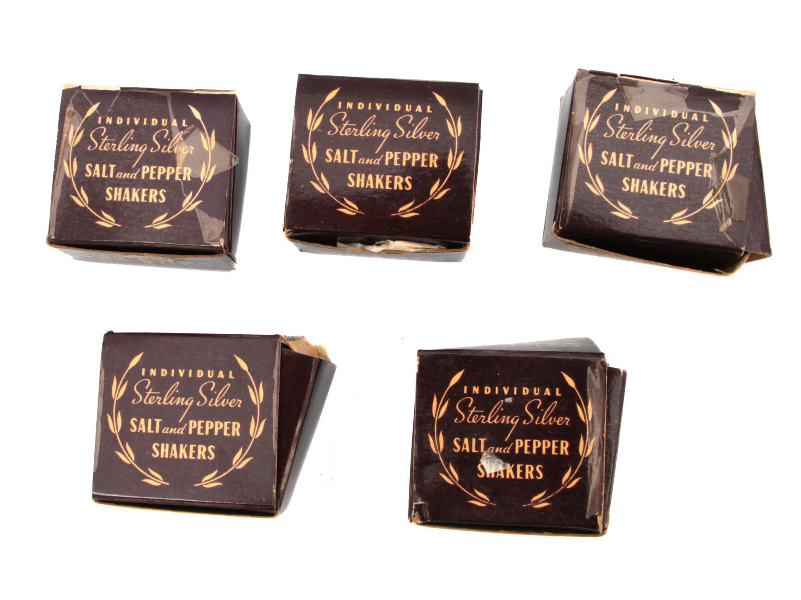 A SET OF FIVE SILVER SALT AND PEPPER SHAKERS (1 of 4)