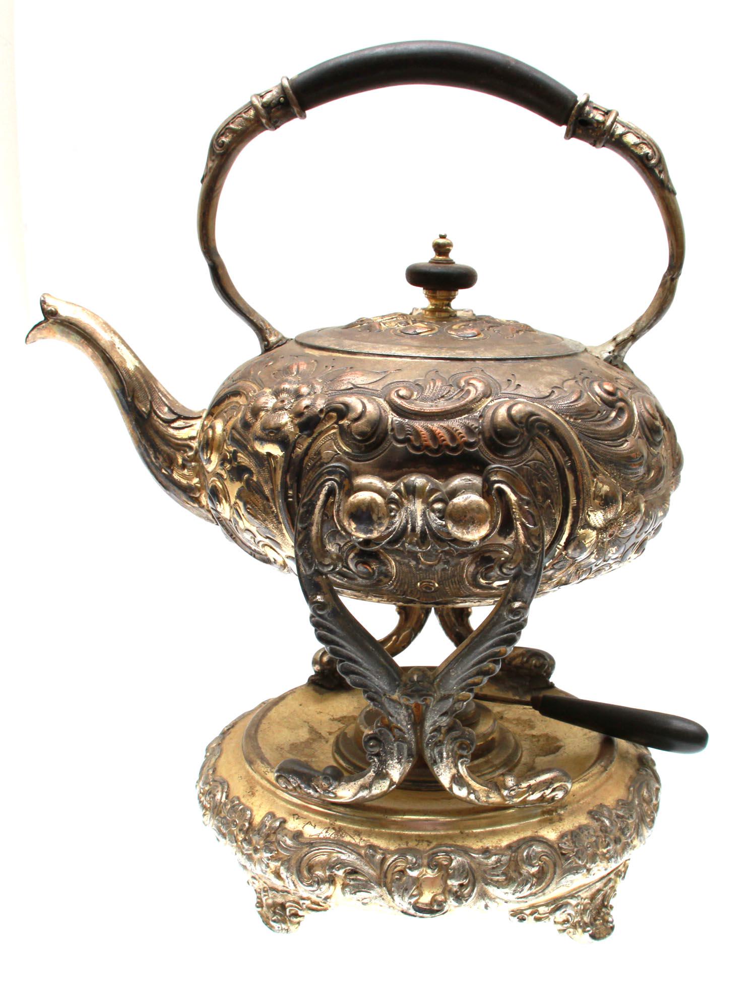 AN ANTIQUE SILVER PLATED TEAPOT ON HEATED STAND (1 of 7)