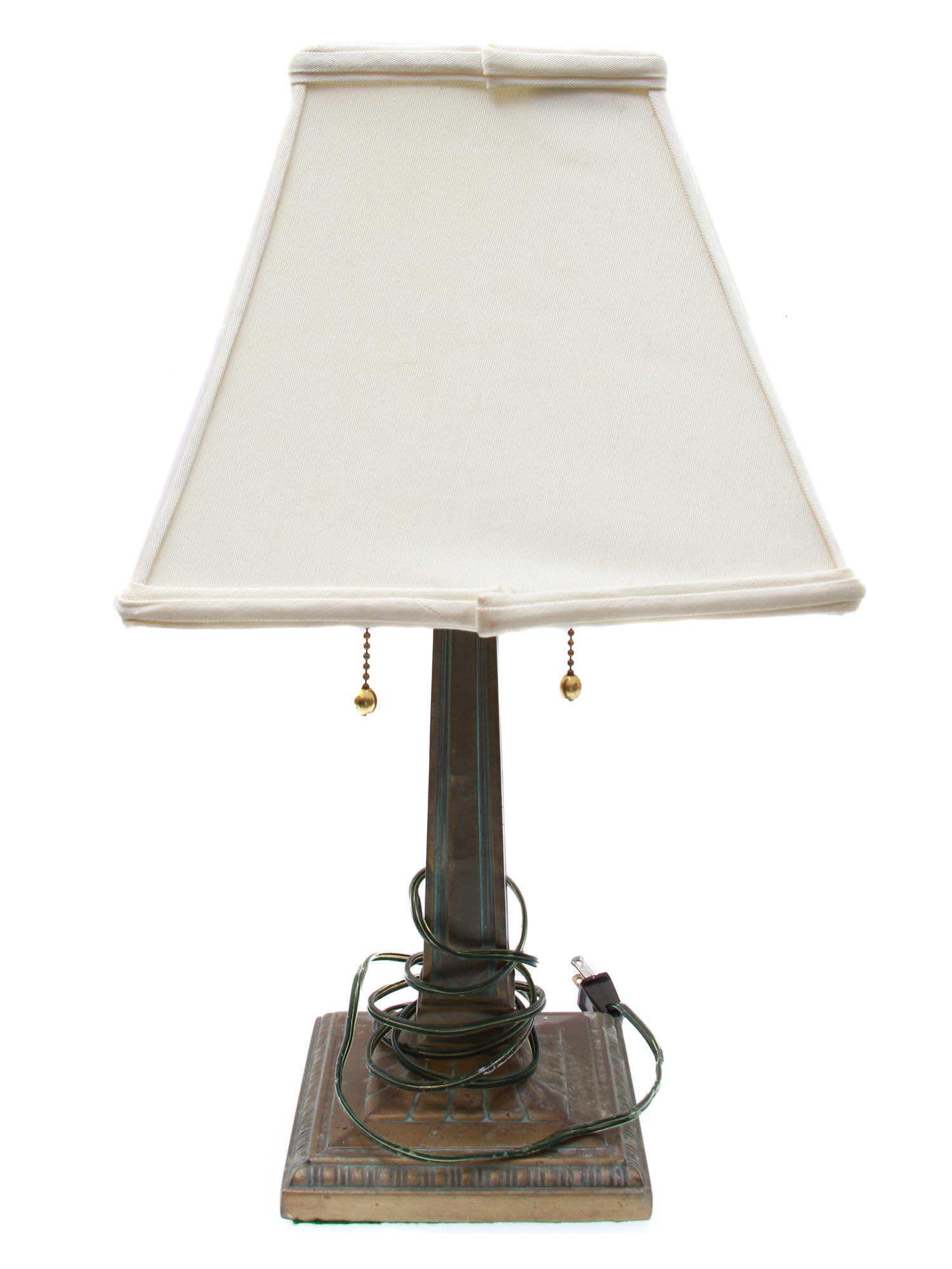 A VINTAGE ORIGINAL WATERFORD TABLE DESK LAMP: A vintage original Waterford table desk lamp with wooden base and leg, fabric lampshade and pull switches. Marked on the label sewn inside the lampshade. Dimensions: H: 20 in.