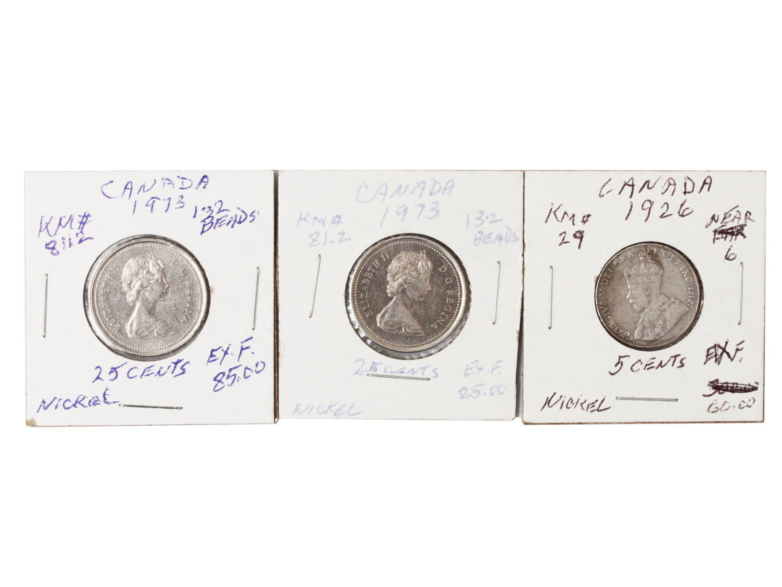 A LOT OF CANADIAN COINS: A lot of Canadian coins that consists of 1 nickel coin valued 5 cents from the year 1926, and 2 nickel coins each valued 25 cents from the year 1973.