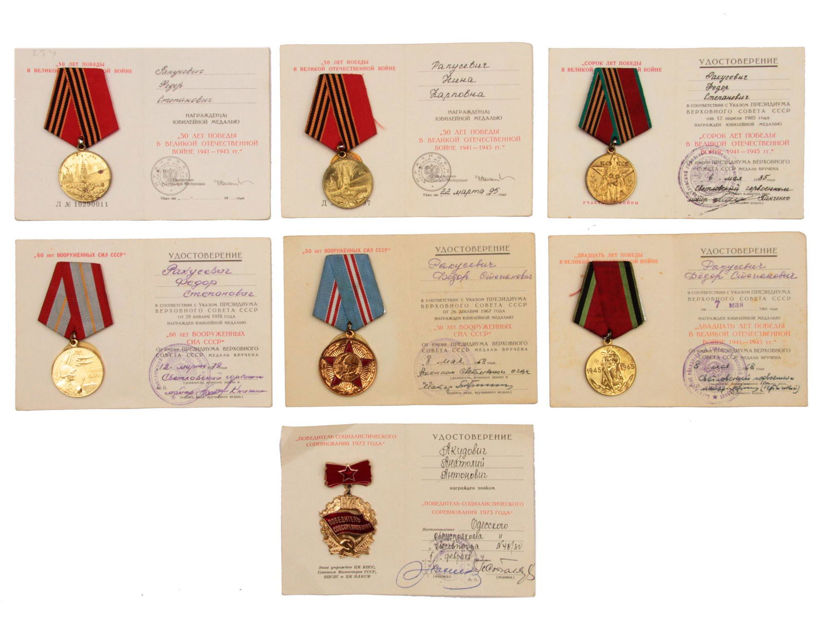 A DOCUMENTED GROUP OF SOVIET MEDALS AND AWARDS: The lot includes: a medal "20 years of victory in the Great Patriotic War", a medal "40 years of victory in the Great Patriotic War", a medal "50 years of victory in the Great Patriotic War", a medal
