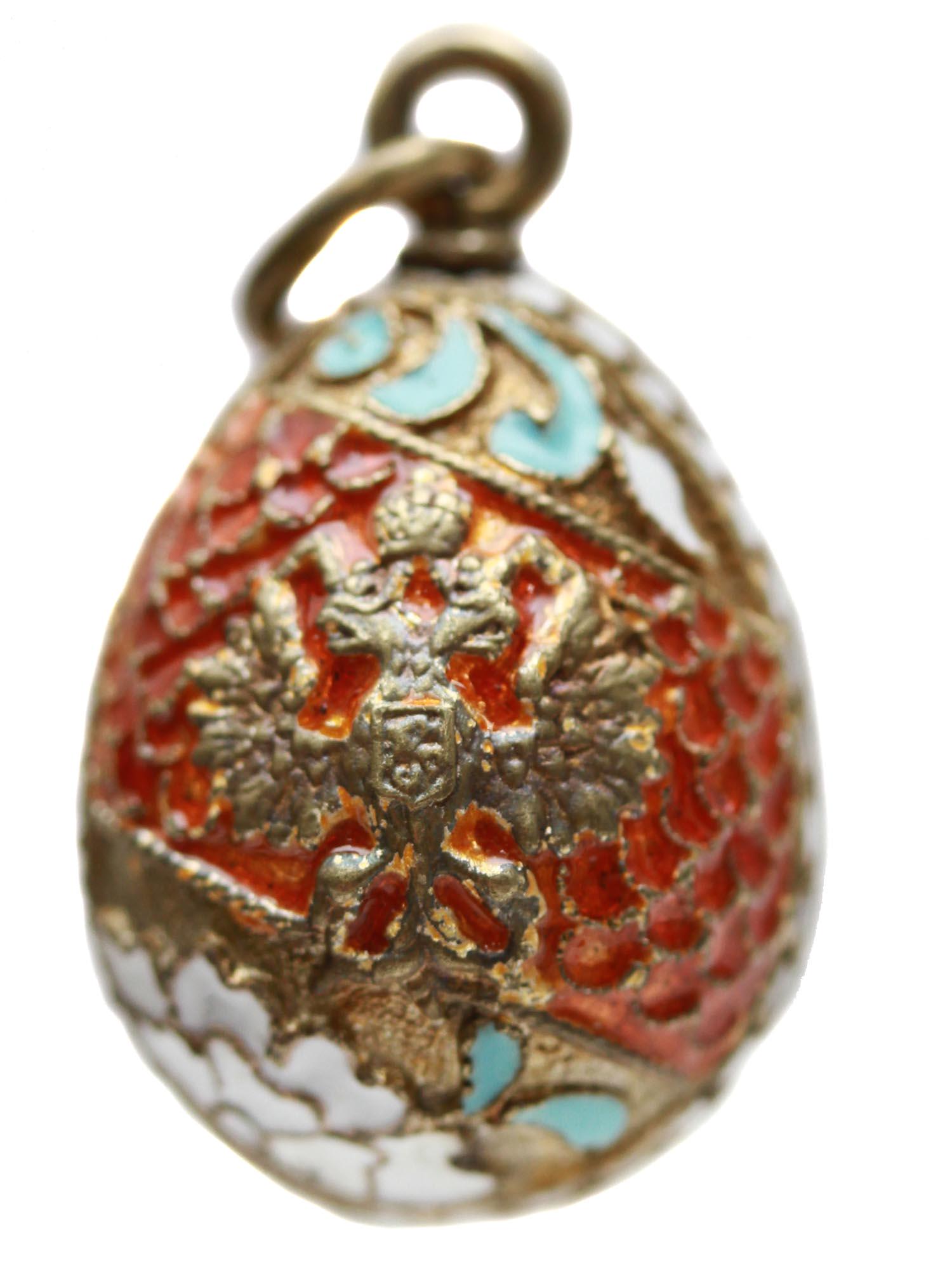 A RUSSIAN GILT SILVER AND ENAMEL EASTER EGG (1 of 7)