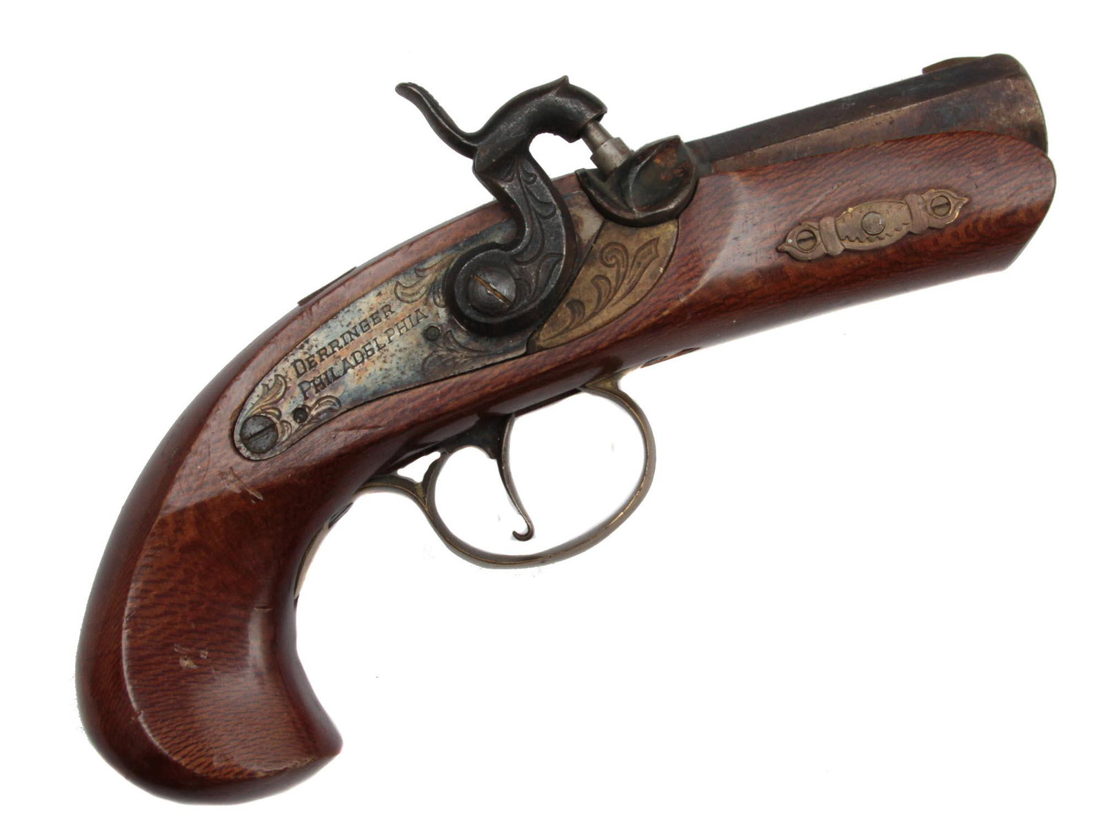 A VINTAGE REPLICA PHILADELPHIA DERRINGER PISTOL: A vintage replica of muzzle loading pistol. Wooden grip, brass trigger guard, octagonal barrel. Marked DERRINGER / PHILADELPHIA. Dimensions: 8 in.
