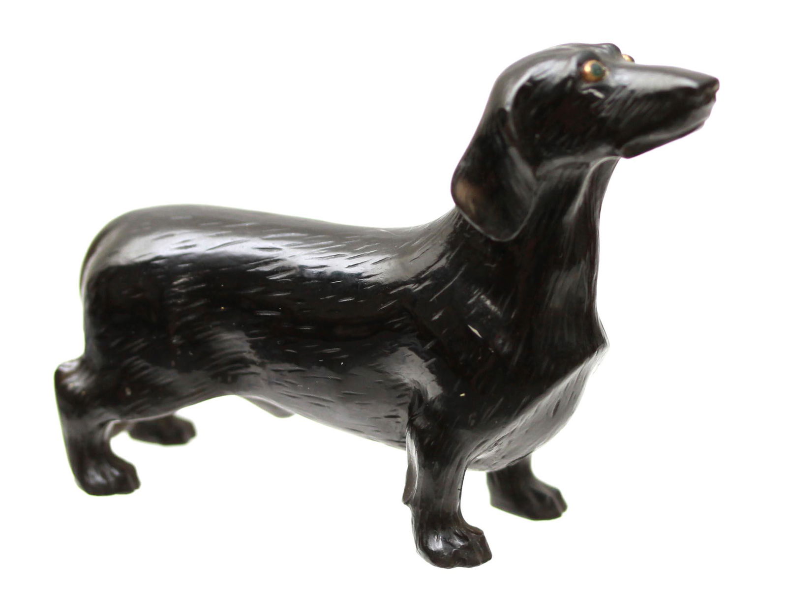 A HAND-CARVED HARDSTONE RUSSIAN FIGURINE OF A DOG (1 of 8)