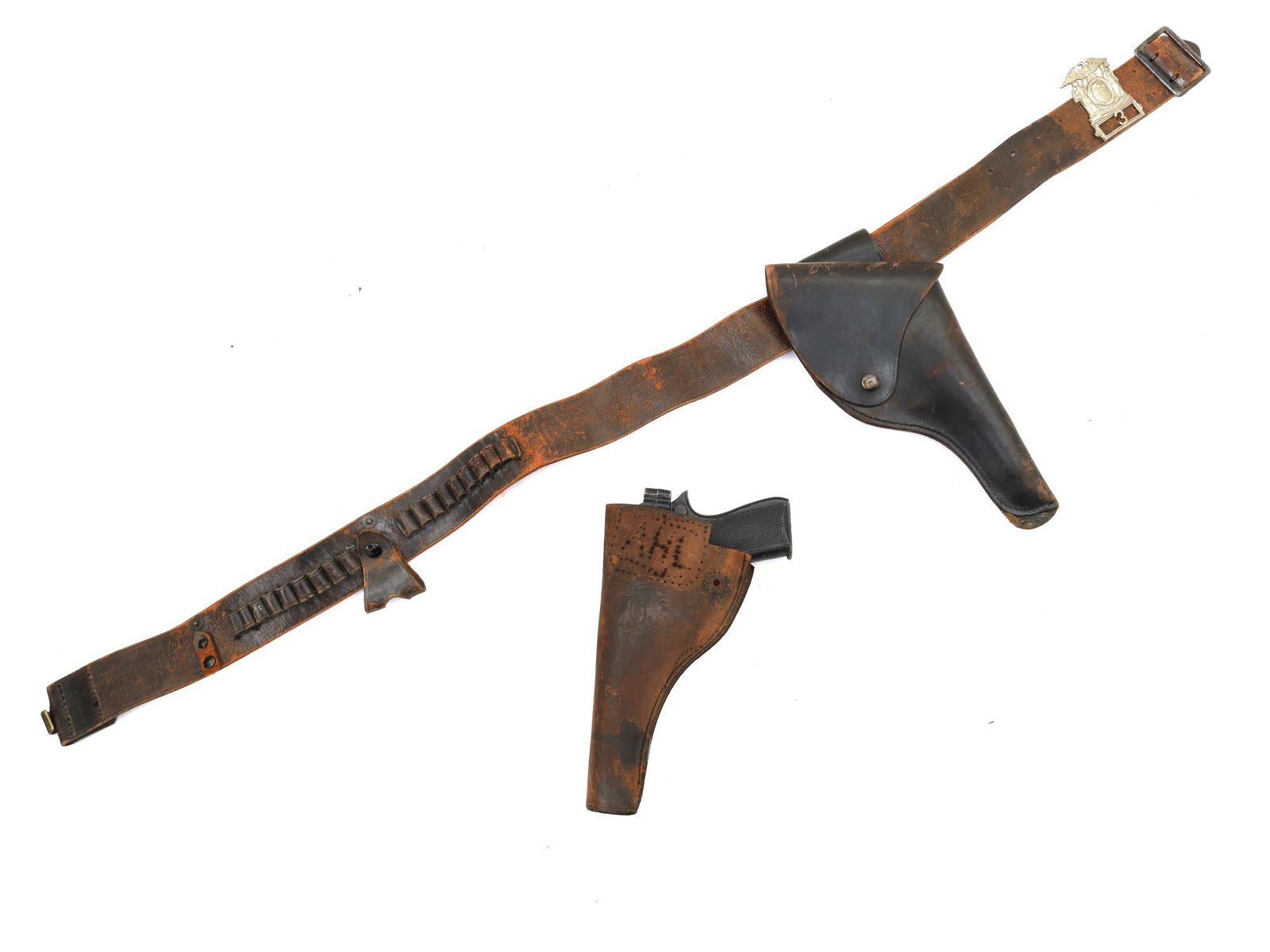 AN AMERICAN ARMY BELT WITH TWO PISTOL HOLSTERS: Dark brown leather belt with metal hardware. Attached to the belt are two leather pistol holsters and a vintage EXCELSIOR # 3 badge in silver-colored metal.