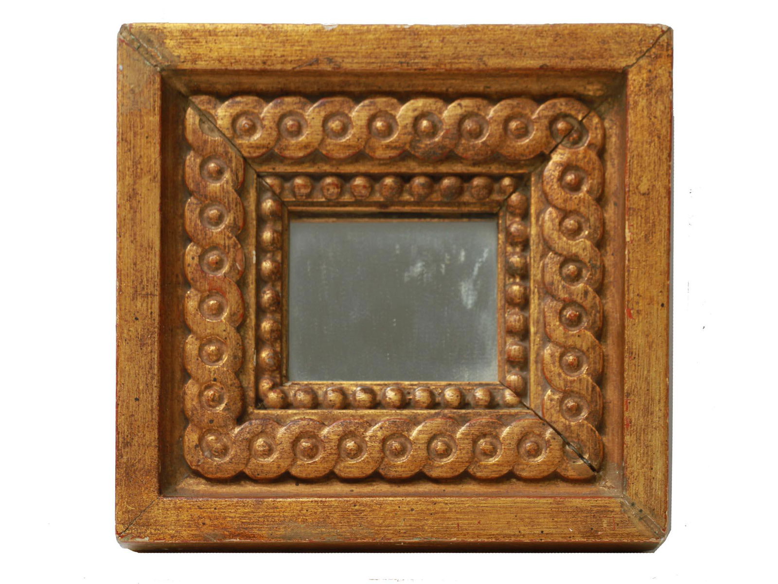 A VINTAGE SMALL MIRROR IN A CARVED WOODEN FRAME (1 of 4)