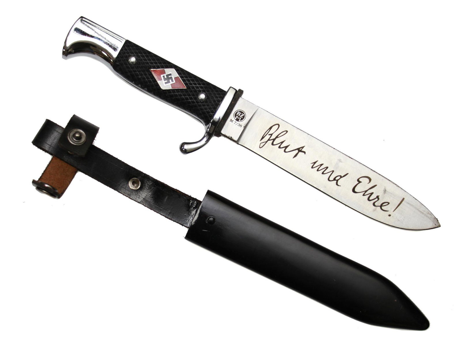 WWII GERMAN THIRD REICH HITLER YOUTH DAGGER: WWII German Third Reich Hitler Youth member original dagger with a black painted magnetic sheet steel scabbard. The black bakelite grip has an enameled diamond with swastika inlay. The blade is engrav