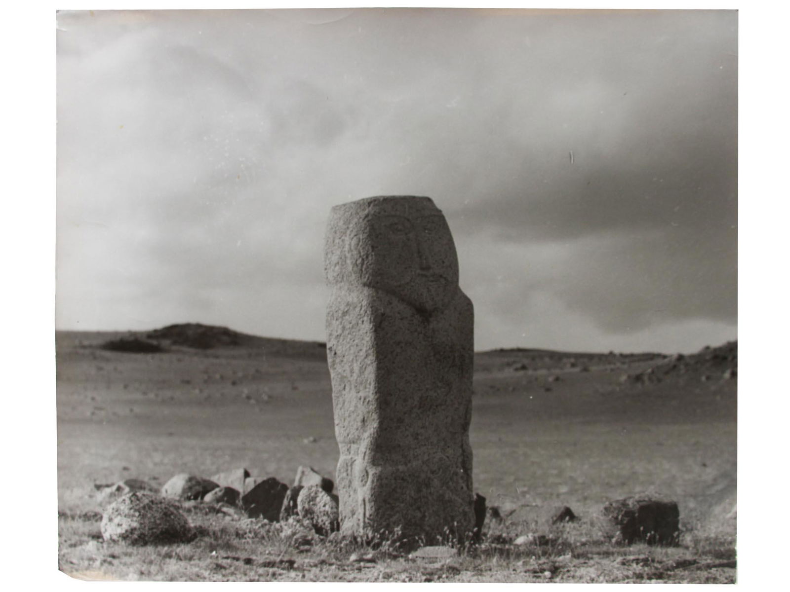 A RARE VINTAGE SOVIET PHOTO OF MONGOLIA 1950'S: A vintage Soviet period black and white photograph with an image of a stone anthropomorphic menhir in the Mongolian steppe. Pencil markings on the back. Dimensions: 16 1/2 X 19 1/2 in.