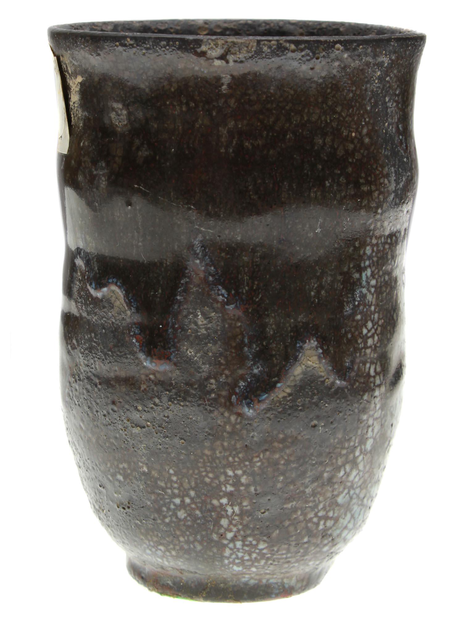 A VINTAGE ARTISTIC GLAZED CERAMIC BY LEA HALPERN: Lea Halpern (Dutch, American, 1901-1985) artistic ceramic cup covered with shiny glaze in grey and black shades with smudges effect. Signed by the artist with initials, L. H., and numbered on the bott