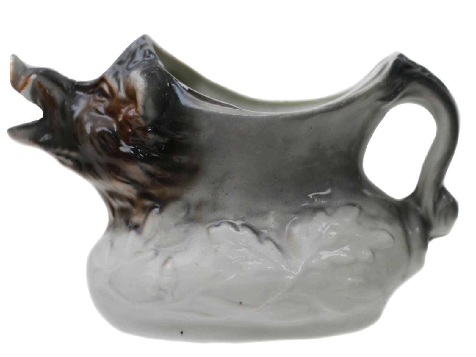 A VINTAGE ROYAL BAYREUTH PORCELAIN BOAR CREAMER: A rare vintage Royal Bayreuth, Bavaria figural creamer shaped like a wild boar. Incised marks: Ges Gesch; number 4816. Marked on the bottom with a blue Royal Bayreuth Bavaria stamp. Dimensions: H: 3 1