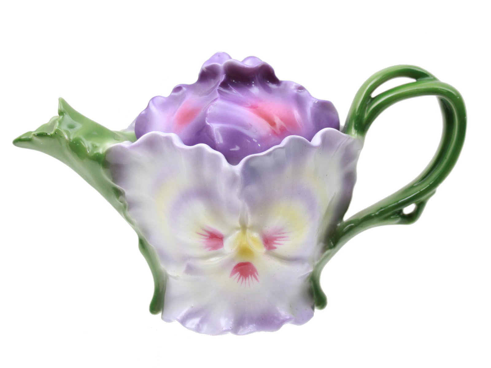 A ROYAL BAYREUTH PORCELAIN PURPLE PANSY TEA POT: An elegant Bavarian Royal Bayreuth porcelain teapot in the form of a purple pansy with a curved green handle and spout. Marked with a blue manufacturer's stamp on the bottom. Circa: the early 20th cen