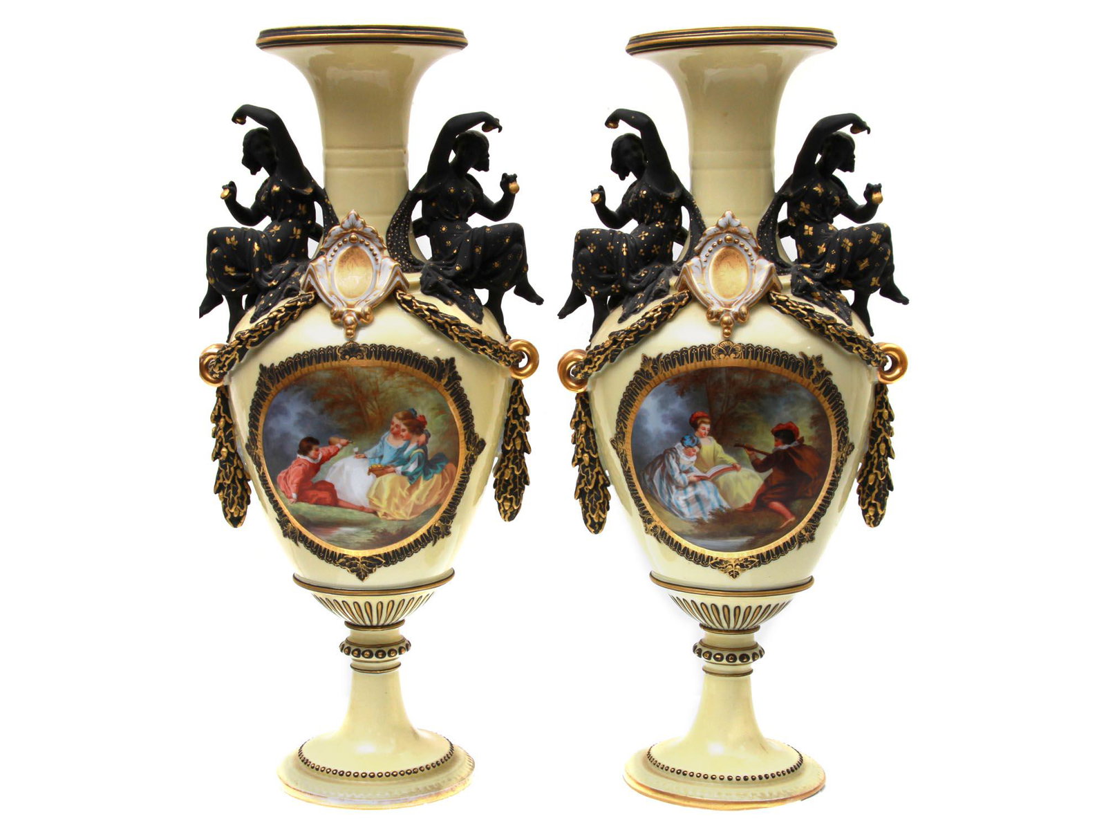 NEAR PAIR OF HENRI ARDANT LIMOGES PORCELAIN VASES: A French near pair of Henri Ardant and Company Limoges biscuit porcelain vases. The vases feature a tall-footed base in cream with applied gold highlights. The bodies of the vases have a hand-painted 