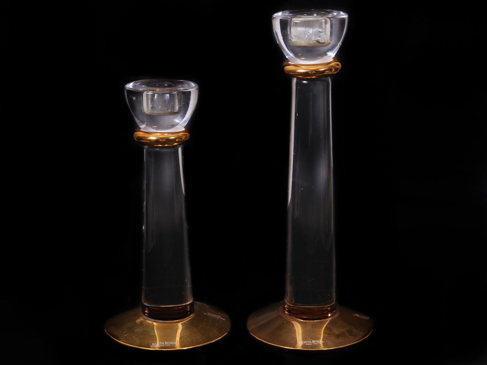 A PAIR OF SWEDISH KOSTA BODA GLASS CANDLE HOLDERS (1 of 4)
