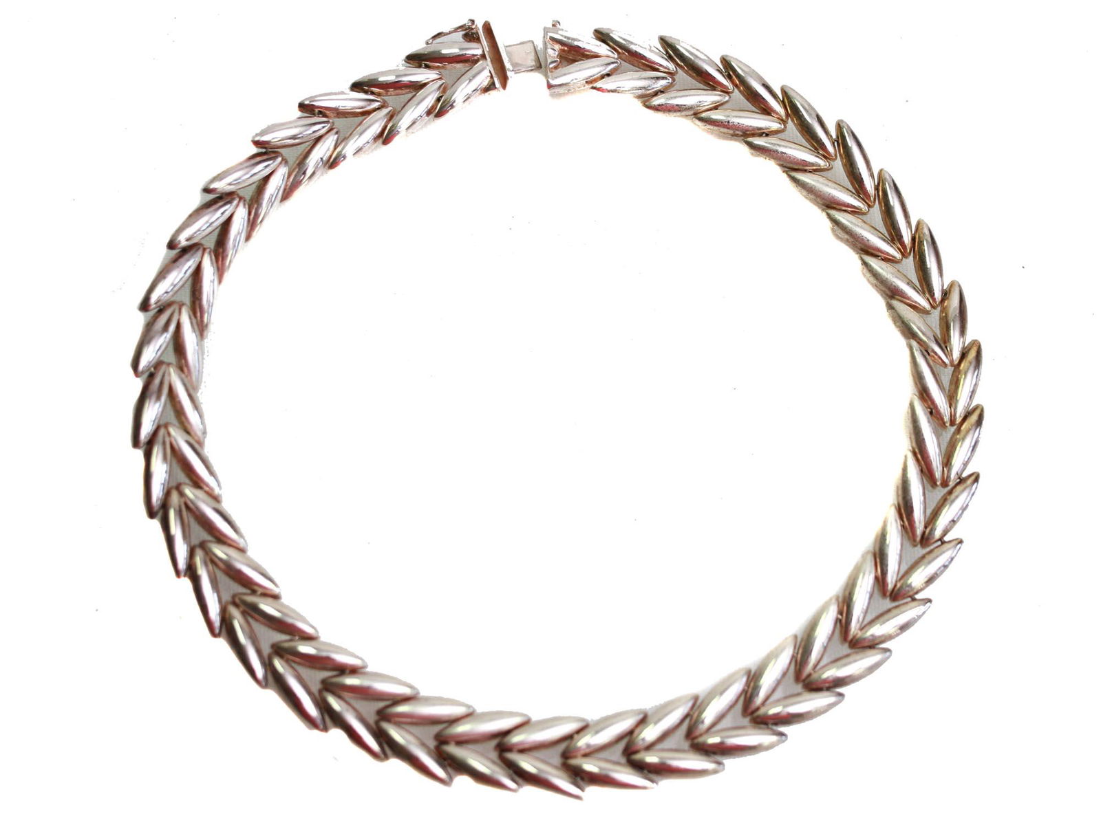 AN ITALIAN STERLING SILVER NECKLACE WITH A CASE: An elegant Italian sterling silver necklace in the form of a braided wreath. Marked with the silver standard mark and another assay mark on the clasp. Comes with a black fabric case with a clasp butto