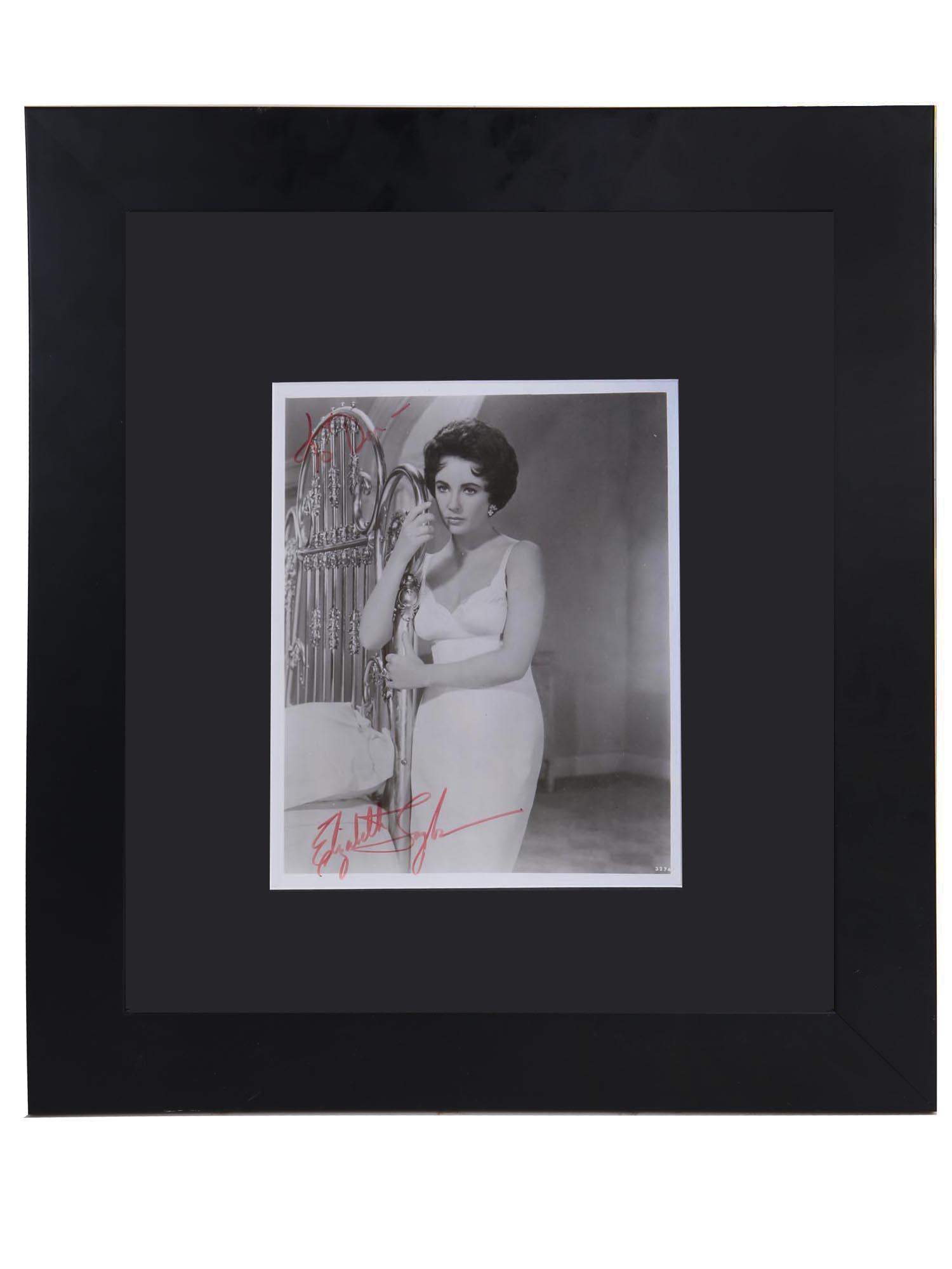 A BLACK & WHITE PHOTO OF ELIZABETH TAYLOR SIGNED (1 of 6)