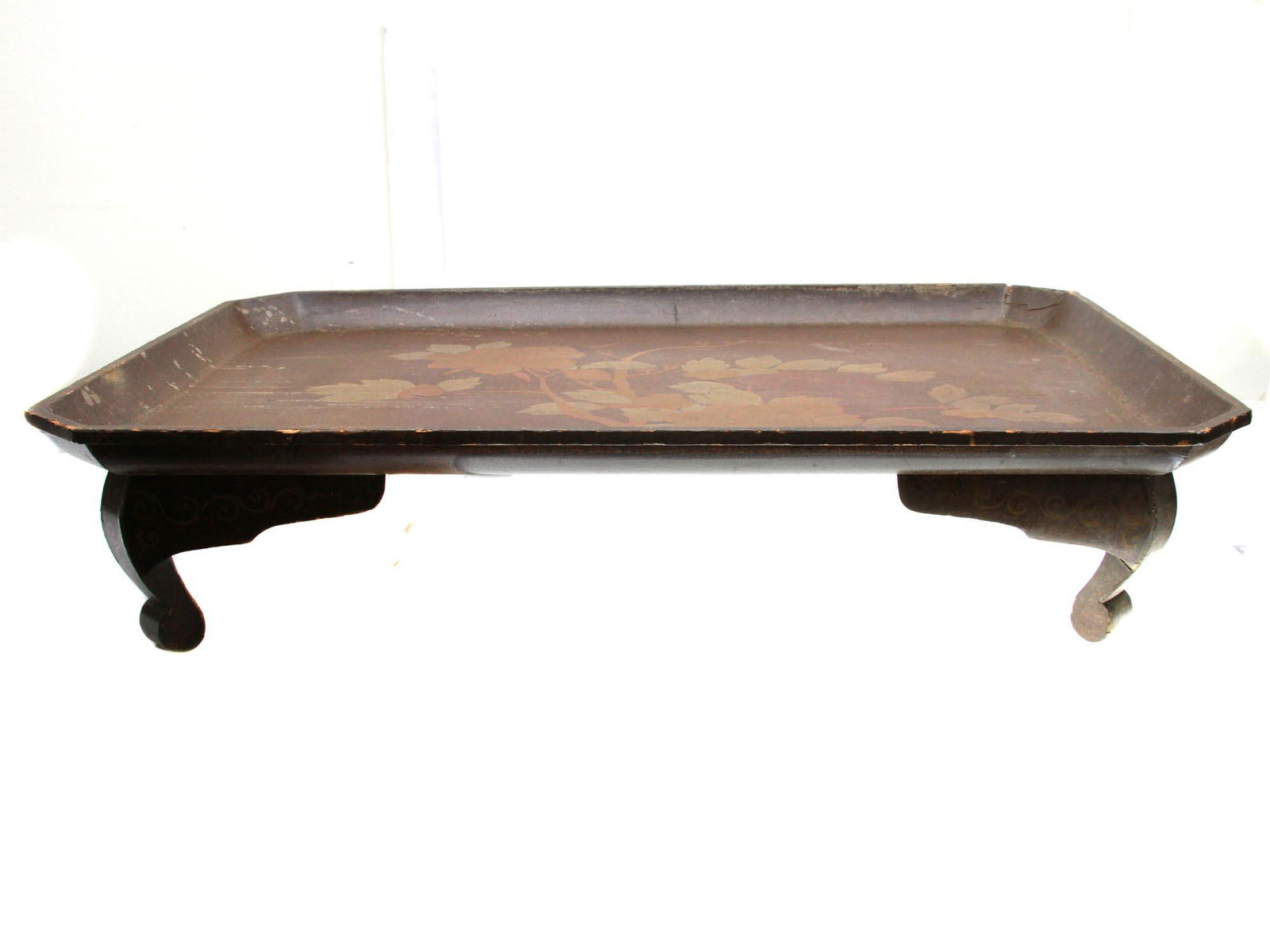 AN ANTIQUE CHINESE WOODEN HAND-PAINTED TABLE: An antique low rectangular tea table hand-painted with beautiful peonies, circa 1900. The edges of the tabletop are slightly curved upwards. Mounted on four curved legs. Dimensions: L: 20 in.W: 20 in.