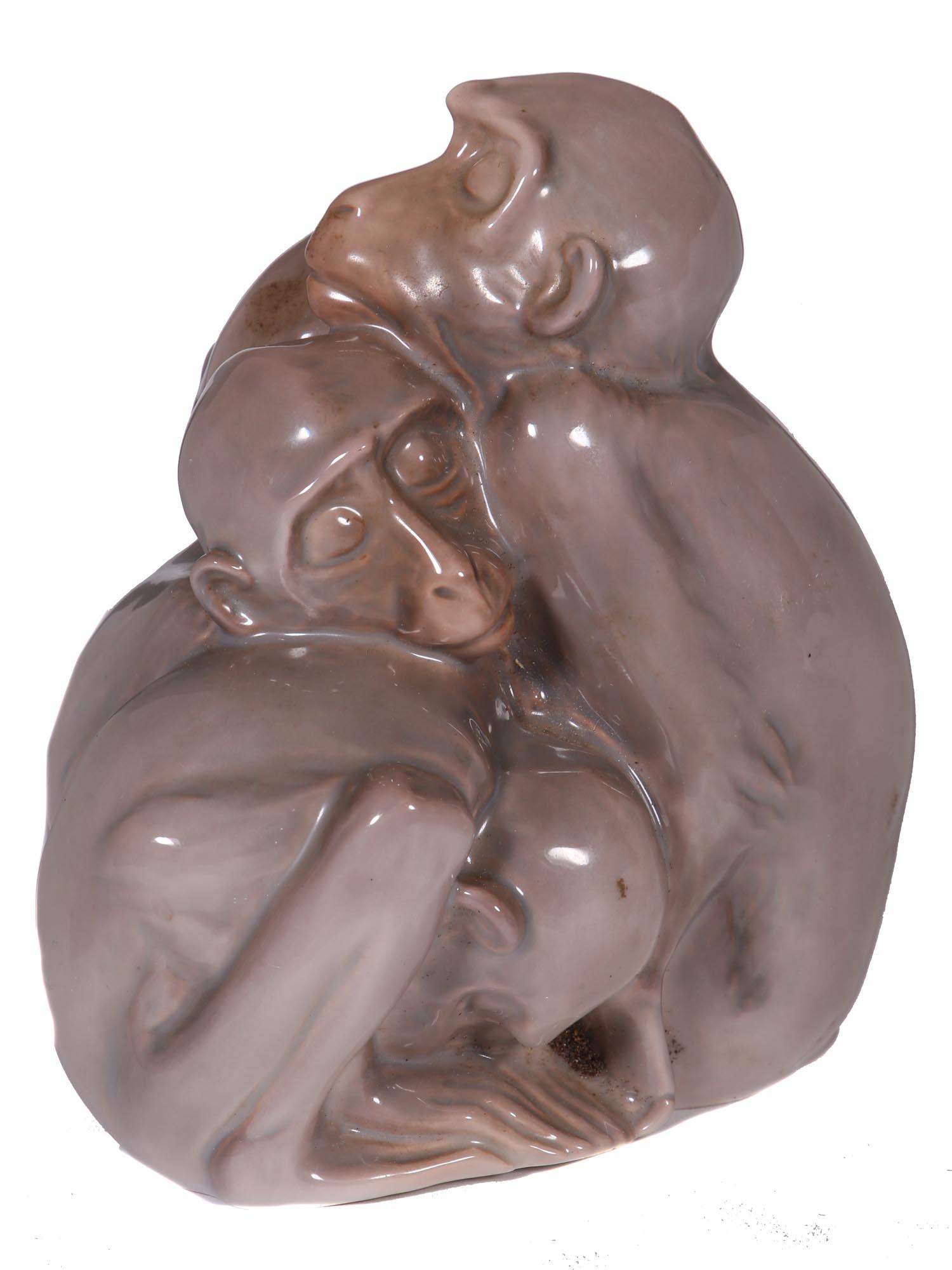 DANISH BING & GRONDAHL PORCELAIN MONKEY FIGURINE: A Danish factory, Bing & Grondahl, Copenhagen, hand underglaze painted porcelain figurine in the shape of a couple of hugging monkeys. Designed by Dahl Jensen. Marked with a manufacturer stamp (Denmar