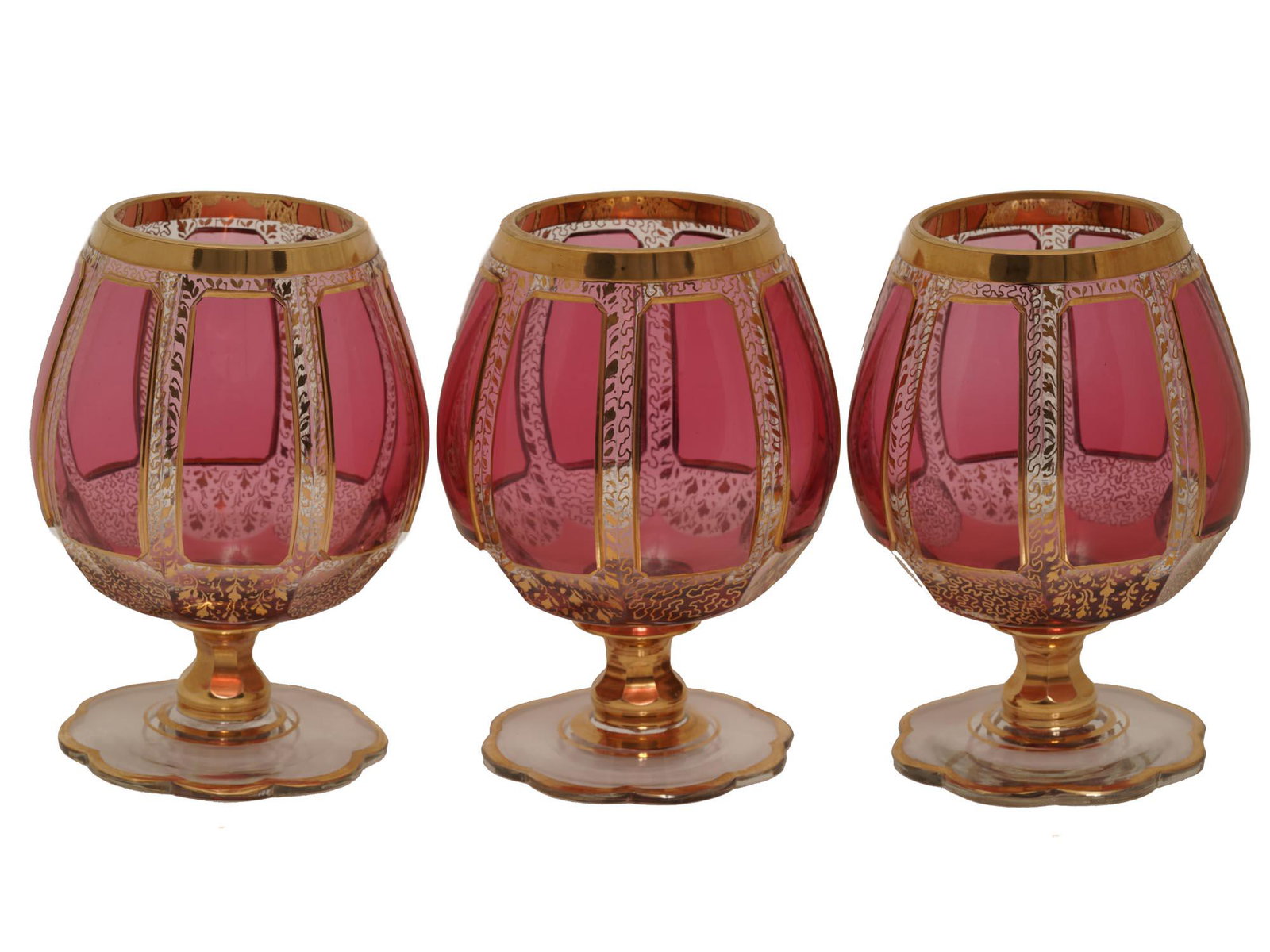 A SET OF THREE VTG FRANZ HEIDE SNIFTER GLASSES: A set of three vintage crystal cognac glasses by Franz Heide / Bohmisch Kamnitz. Painted in pink with fine gold outlines. Manufactured in Venezia. Circa 1920s-1930s. Dimensions: 5" in TallAll measurem