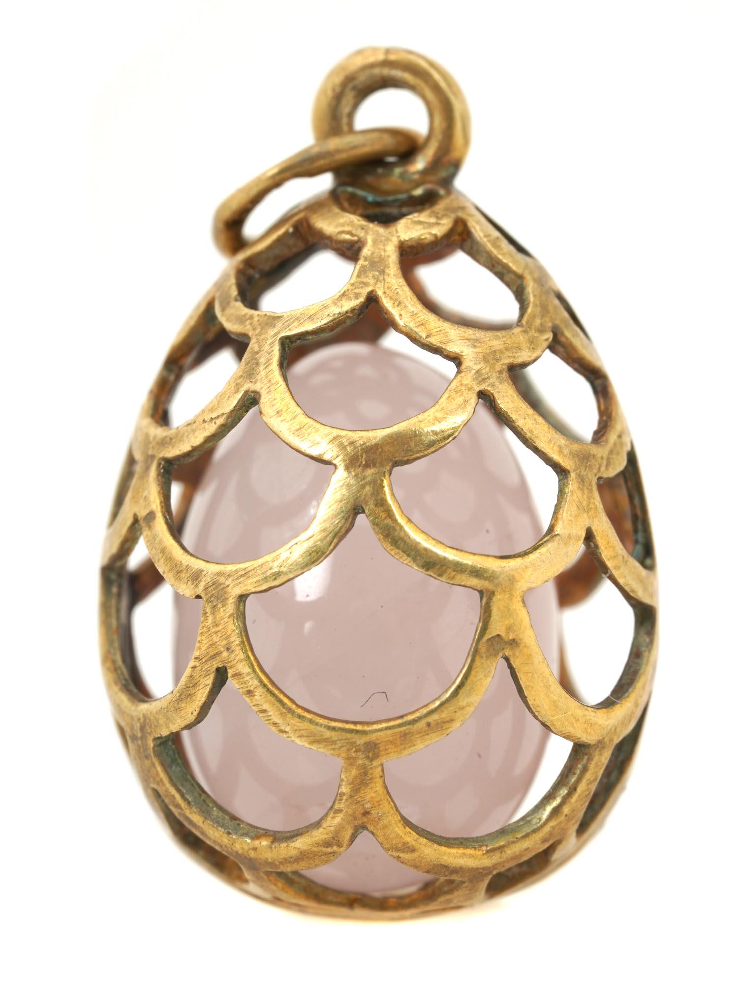A RUSSIAN GILT SILVER ROSE QUARTZ EGG PENDANT (1 of 5)