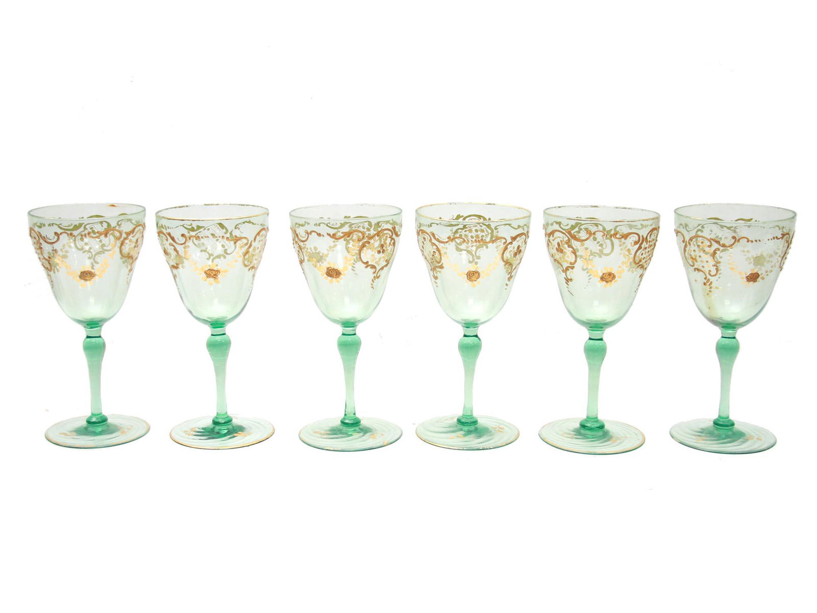 A SET OF SIX ANTIQUE GOLD GUILT WINE GLASSES: Six vintage hand blown crystal glasses for wine and cherry in fine gilt foliate decoration. Footed Cups For Liquors Made With Mint Green Glass And Hand Decorated. No chips or cracks. Vintage Luxurious