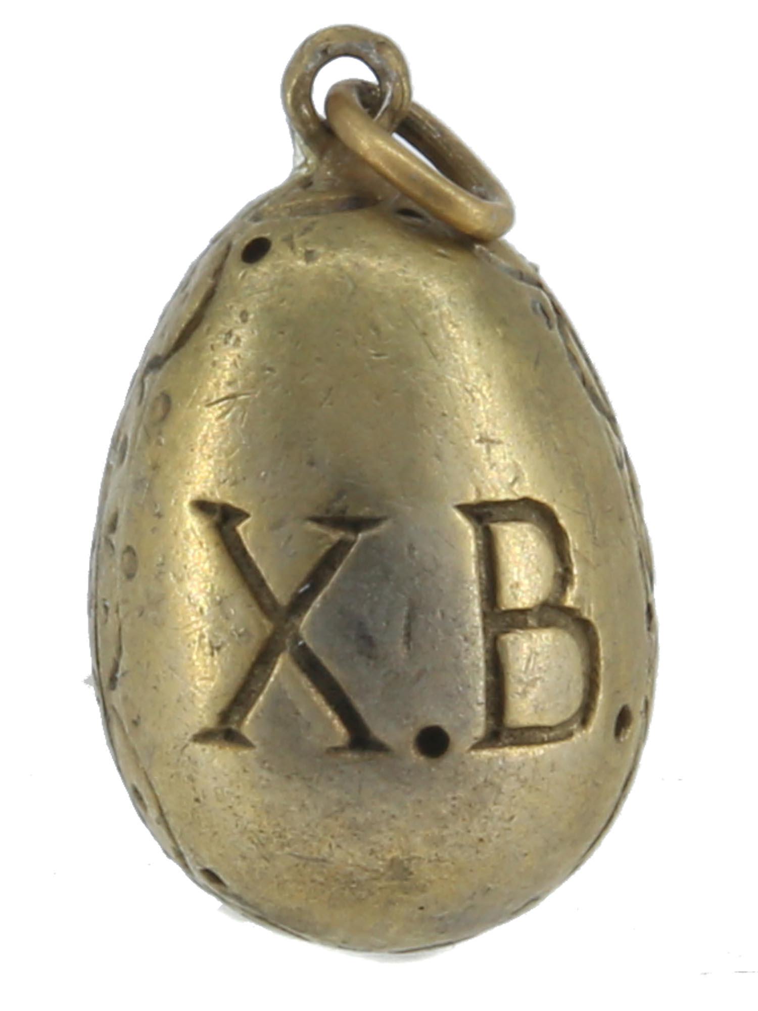 A RUSSIAN BRASS EASTER EGG PENDANT (1 of 5)
