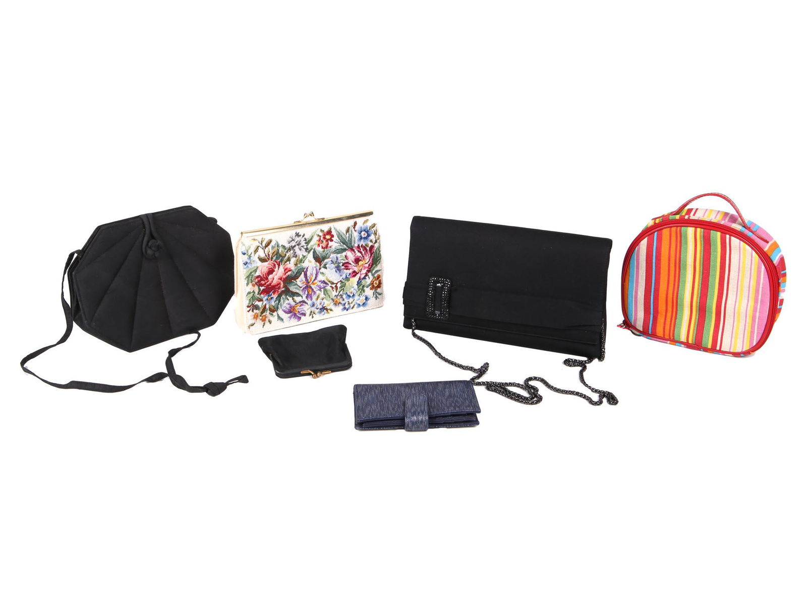A LOT OF 4 VINTAGE HANDBAGS AND 2 WALLETS: A collection of women's purses and wallets. Includes a colorful Vanity purse, a canvas clutch with embroidered flowers, the Jim Thompson purse made in Thailand of 100 percent Thai silk, and the purse