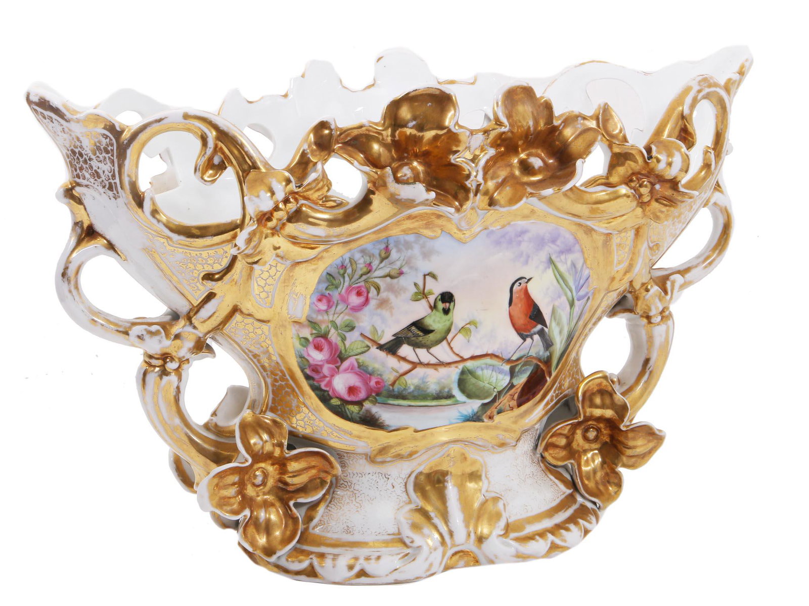 AN ANTIQUE FRENCH PORCELAIN CENTERPIECE, 19TH C.: A graceful French 19th-century porcelain centerpiece. Molded with pierced foliage and branch form handles; two medallions are painted with scenes depicting birds and flowers. Richly decorated with gil