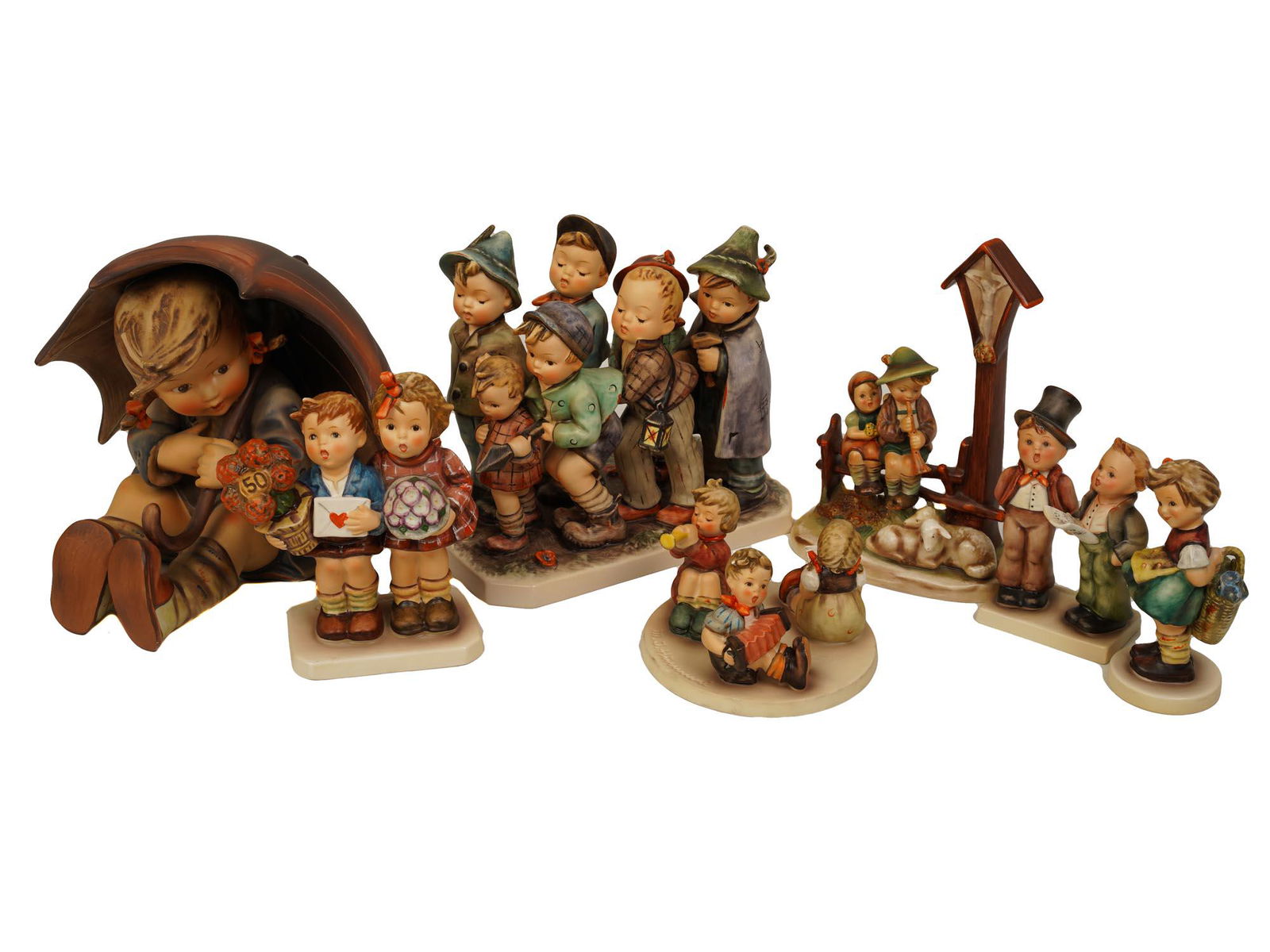 A COLLECTION OF HUMMEL PORCELAIN FIGURINES (1 of 11)