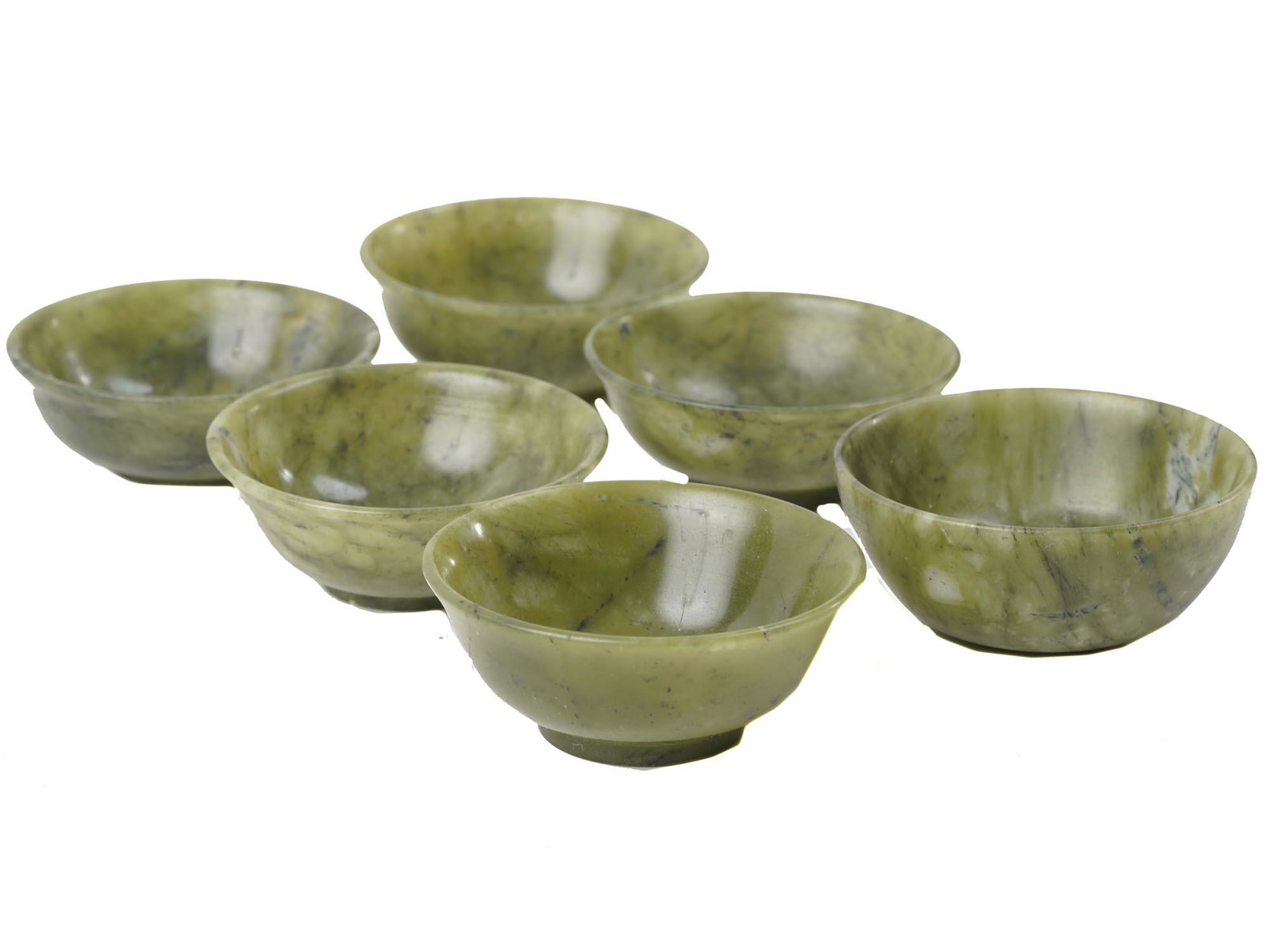 CHINESE SET OF 6 HAND CARVED JADE TEA CUPS: A precious set of six miniature vintage Chinese tea cups hand carved of slightly translucent natural green jade. Unmarked. Collectible Chinese Serveware, Home Interior Items And Gifts. Dimensions: 1 7