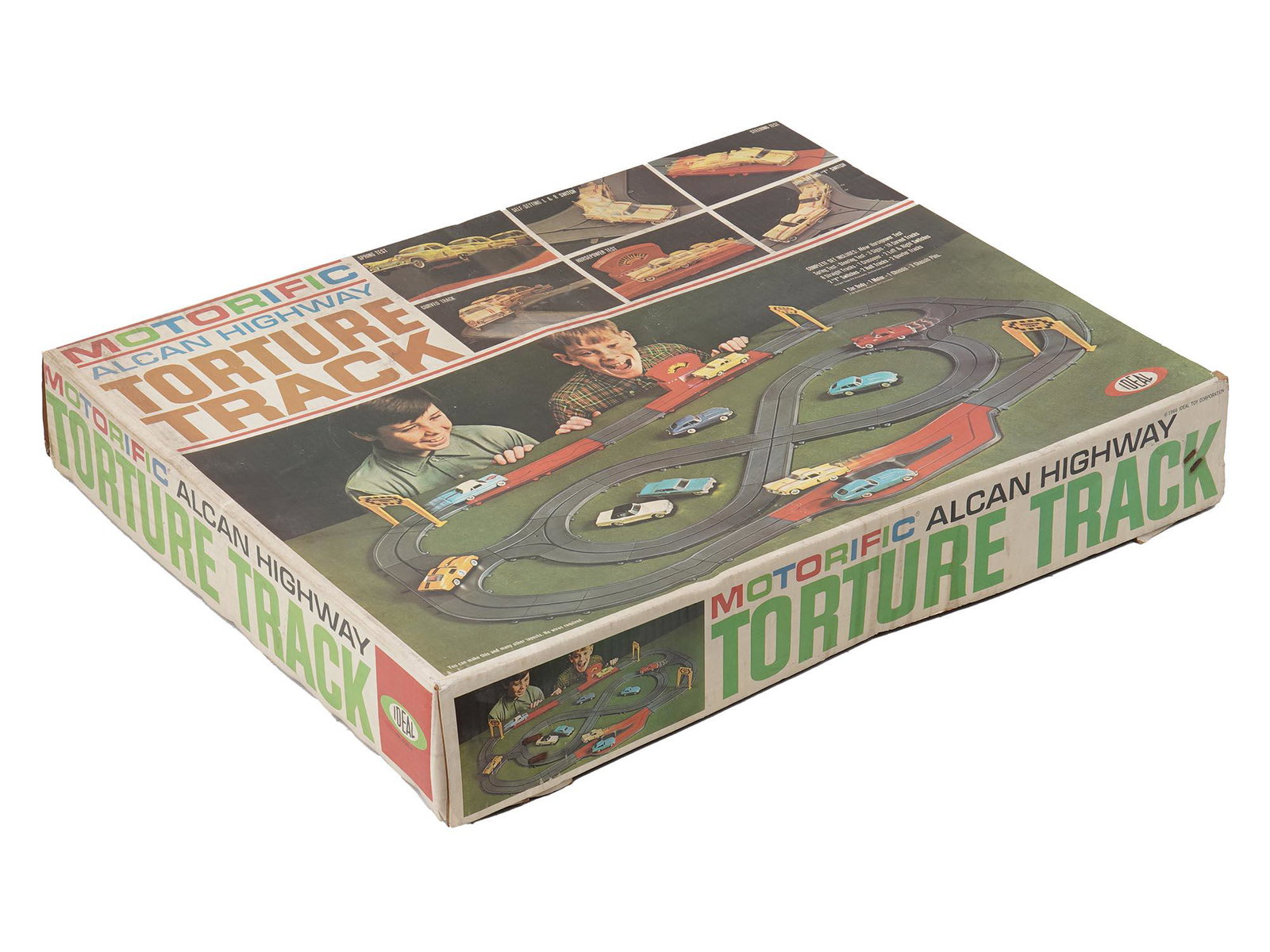MOTORIFIC ALCAN HIGHWAY TORTURE TRACK RACING SET: A Motorific Alcan Highway Torture Track racing play set. The set is made by Ideal, and contains eighteen curved tracks, one XKE Jaguar body, one white Ferrari body, one chassis and motor, one horsepow