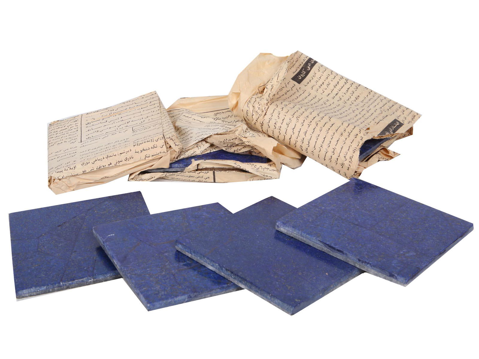 VINTAGE AFGHAN LAPIS LAZULI TILES NATURAL STONE: A set of ten vintage Afghan lapis lazuli tiles natural stone pieces. Made in Pakistan. Dimensions: 4" x 4" in. All measurements are approximate