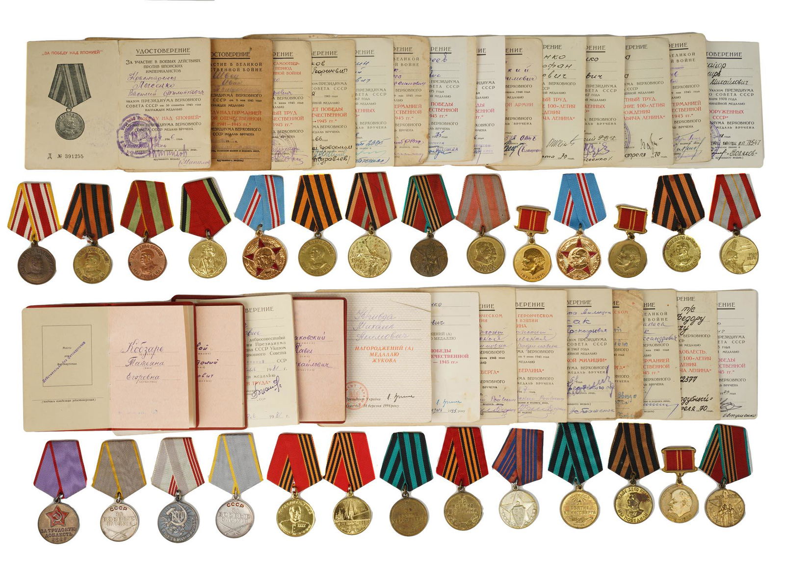 A SOVIET MILITARY AND CIVILIAN MEDALS COLLECTION: A huge collection of 27 original Soviet military and civilian medals with ribbons. Including For Valiant Labour in the Great Patriotic War 1941â€“1945, For the Victory over Germany in the Great P