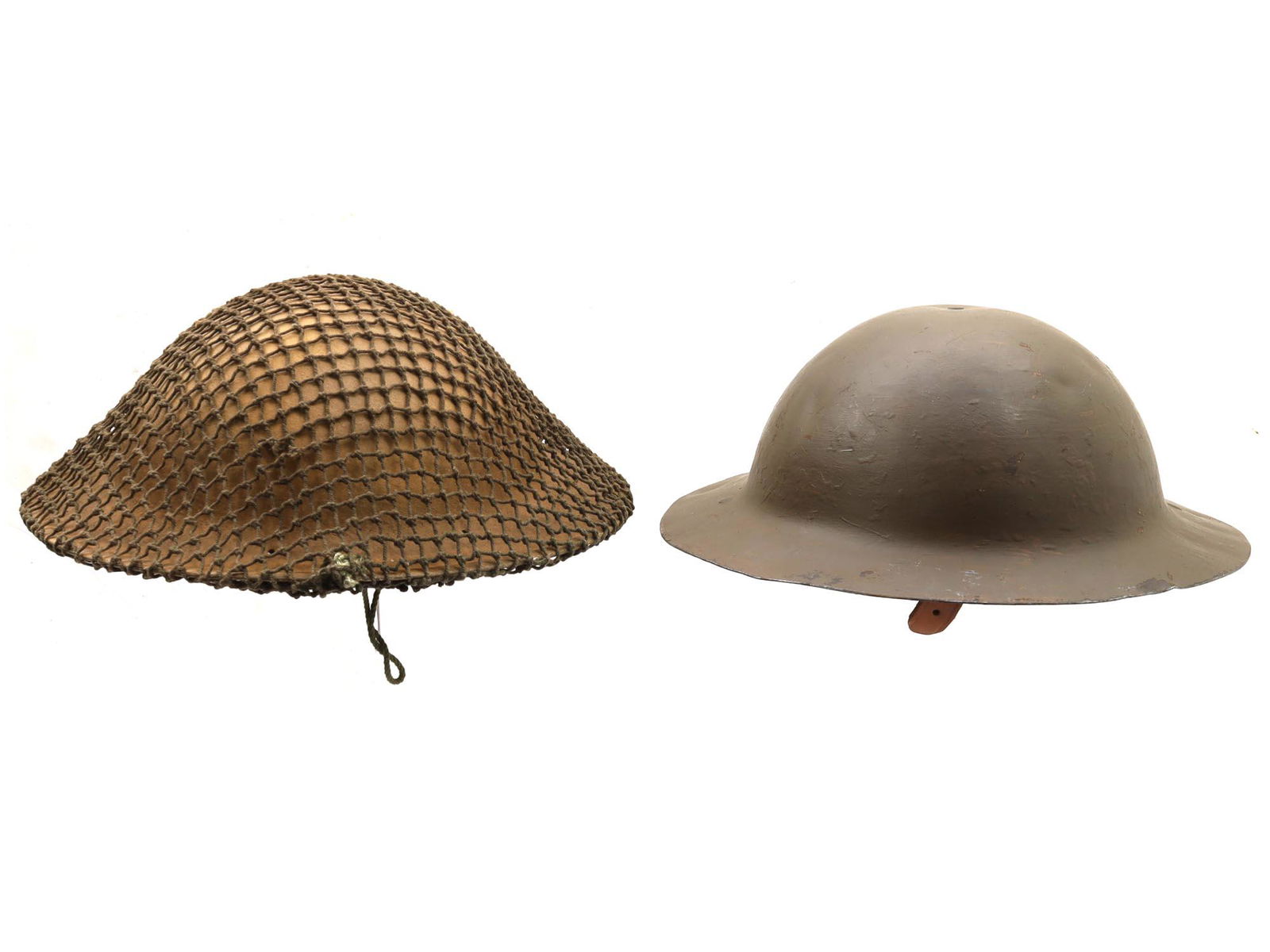 A PAIR OF BRITISH WWII BRODIE MKII HELMETS (1 of 5)