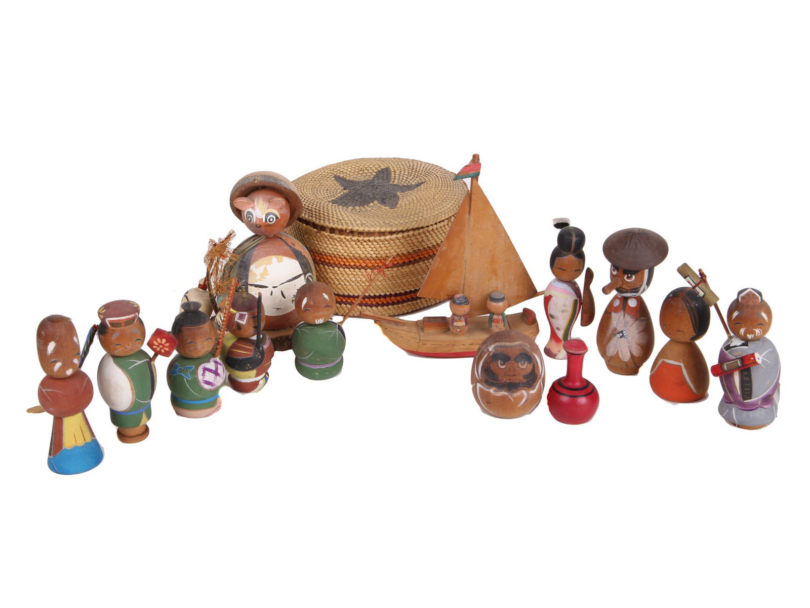 A COLLECTION OF VINTAGE KOKESHI DOLLS FROM JAPAN: A collection of charming traditional Japanese handcrafted wooden dolls Kokeshi, includes 13 dolls and a round woven straw trinket box with a star. Vintage Japanese collectibles for home decor.Includes