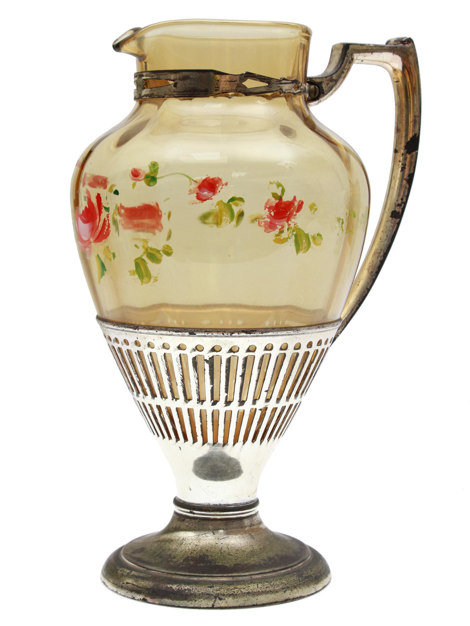 AN ANTIQUE SILVER PLATED AND GLASS PITCHER (1 of 3)