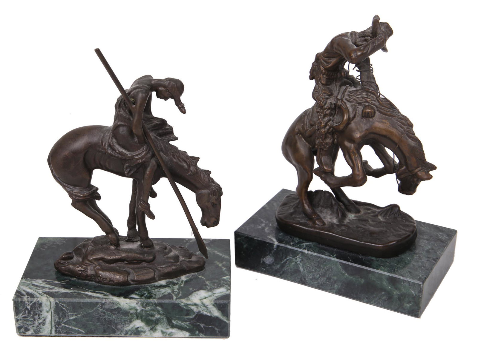 VINTAGE BRONZE FIGURINES BY FREDERIC REMINGTON: Frederic Remington (American, 1861â€“1909) two bronze sculptures named End of the Trail and Rattlesnake. Mounted on green marble bases. With a signature in the cast. Circa: the 1940s-1960s.Freder