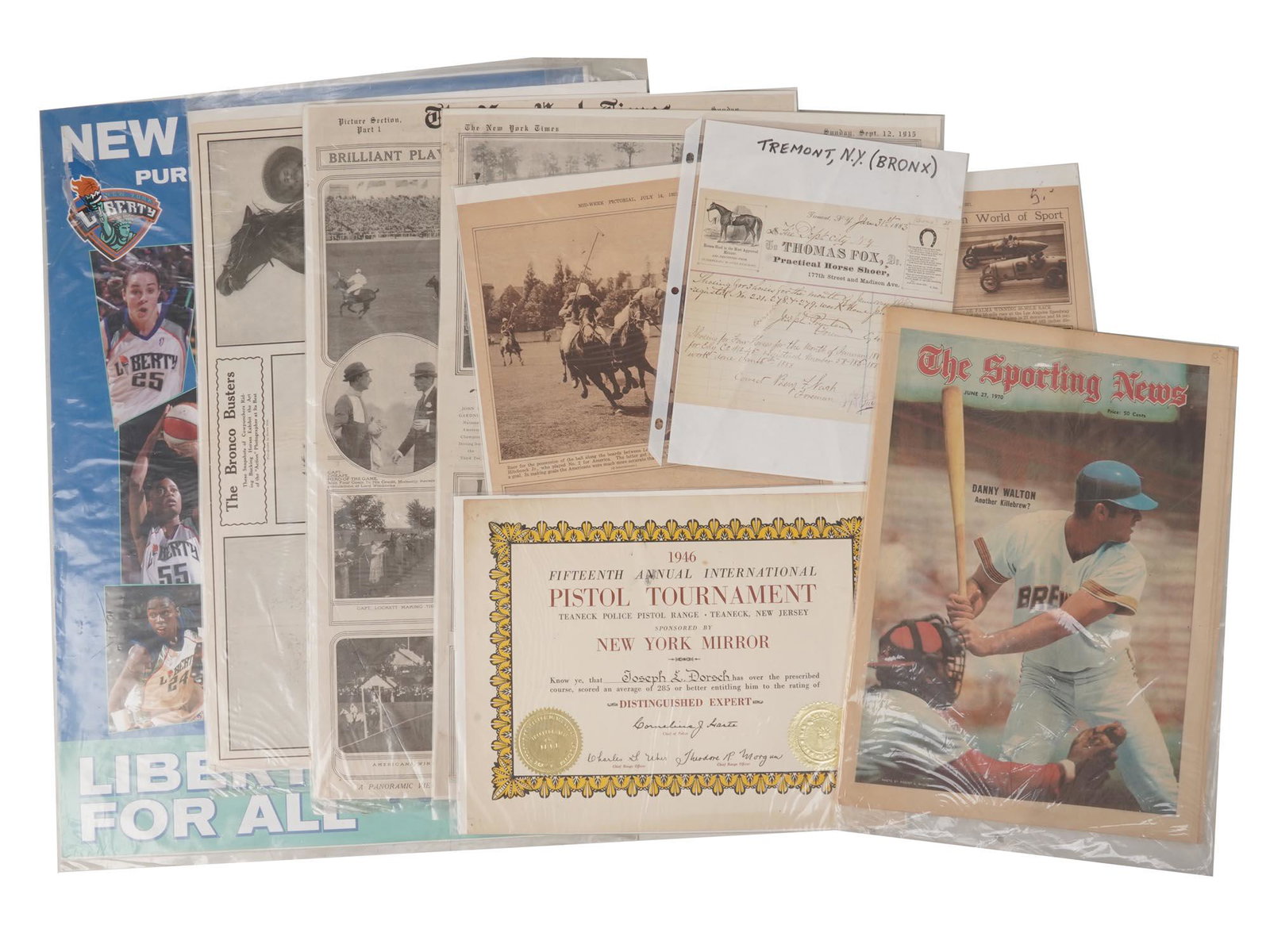 LOT OF VINTAGE ANTIQUE SPORT RELATED PUBLICATIONS: The lot includes a Fifteen Annual International 1946 Pistol Tournament Certificate, The New York Liberty, Panasonic vintage poster, The New York Times Golf publication, Sept. 12, 1915, The New York Ti