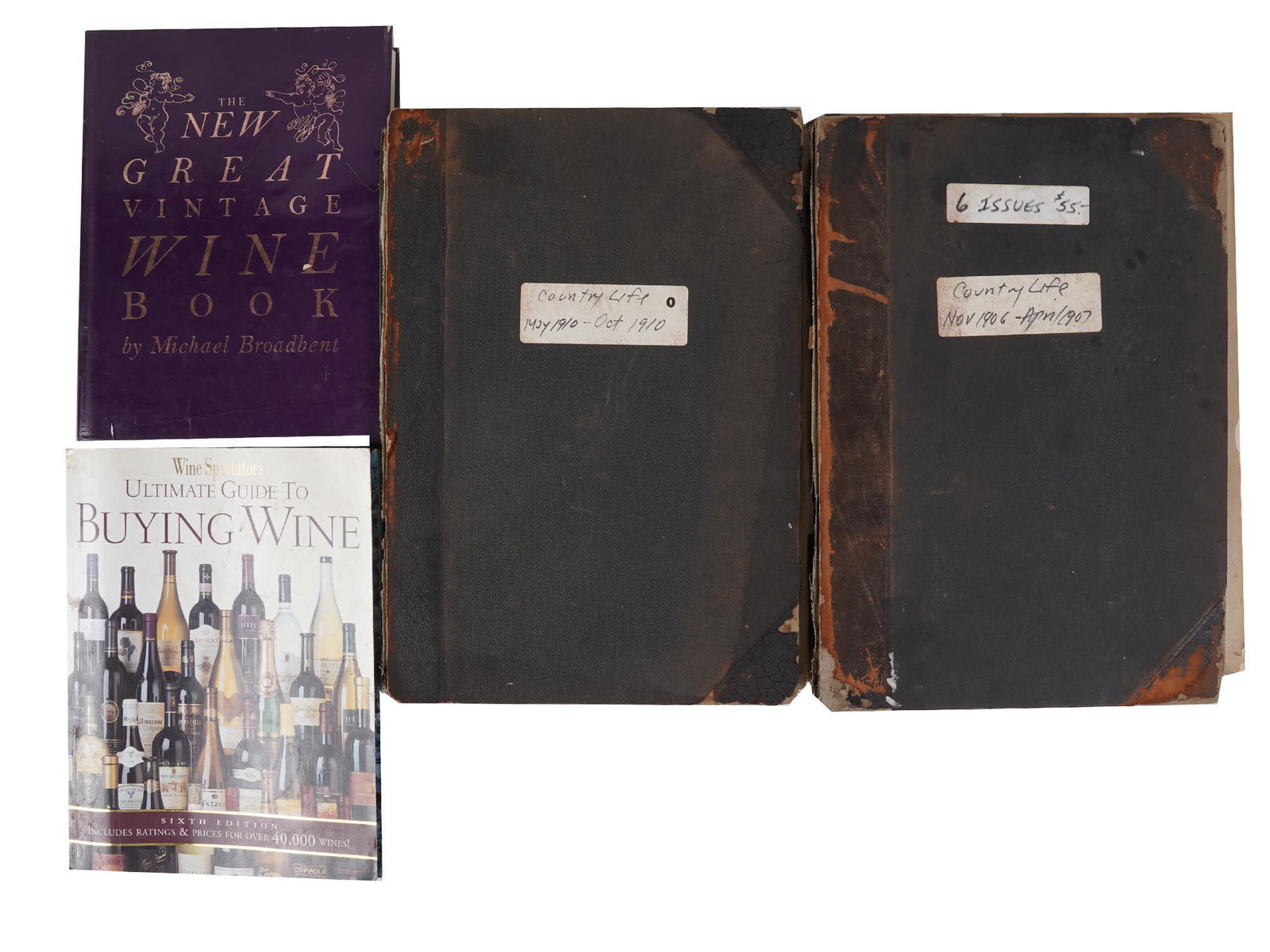 ANTIQUE AND VINTAGE WINE AND COUNTRY LIFE BOOKS: A collection of American antique and vintage lifestyle books. A total of four items. Two folders of Country Life magazine with color illustrations, November 1906 to April 1907, May-October 1910. Micha
