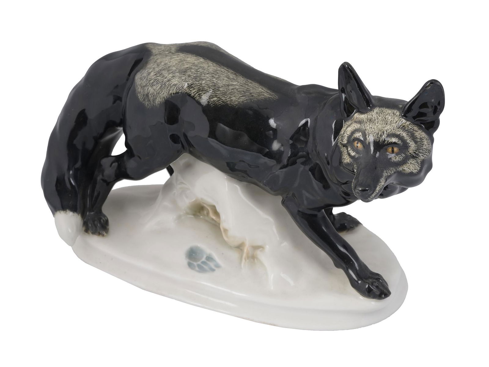 ANTIQUE MEISSEN SILVER FOX FIGURINE ERICH HOESEL: An antique German Art Nouveau porcelain silver fox figurine. Designed by Erich Hosel (1869-1951). Manufactured by Meissen, marked on the back. Circa 1910s-1920s. Dimensions: Tall 6 1/4" in. Length 10