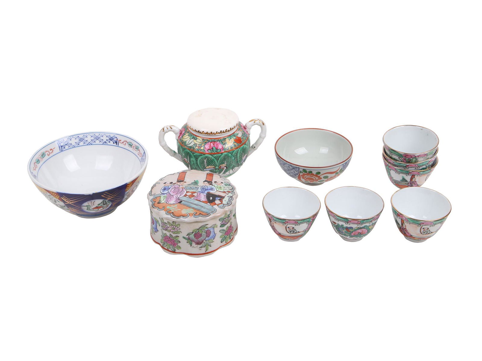 VINTAGE CHINESE MID CENTURY PORCELAIN SERVEWARE: The lot includes six vintage Famille Rose hand painted tea cups with golden trims, a sugar bowl with two bamboo stems shaped handles and hand painted Famille Rose design, marked underneath with hierog