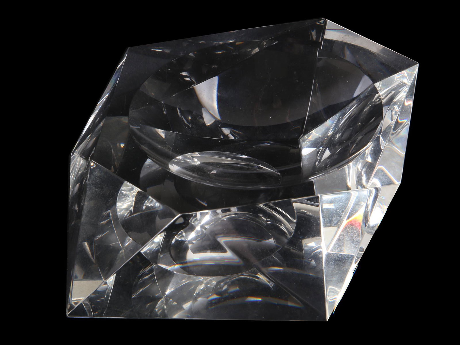 A SOVIET 1930S AVANT GARDE STYLE CRYSTAL ASHTRAY: A Russian Soviet 1930's laconic crystal ashtray with crisp edges. Dimensions: 4 1/2" in. Length. All measurements are approximate.